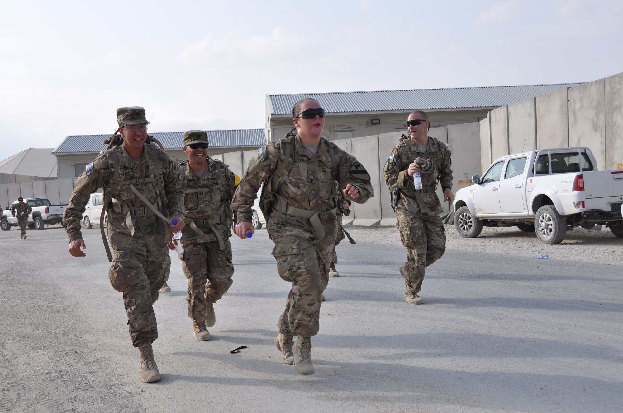 Ninety-two teams participated in the 5-kilometer ‘Got Consent?’ ruck march at Bagram Airfield, Afghanistan, Aug. 3, 2013. The event, hosted by the 455th Air Expeditionary Wing sexual assault response coordinator, was comprised of four-person teams who competed in the march carrying a 30-pound rucksack on their backs. (U.S. Air Force photo/Tech. Sgt. Rob Hazelett)