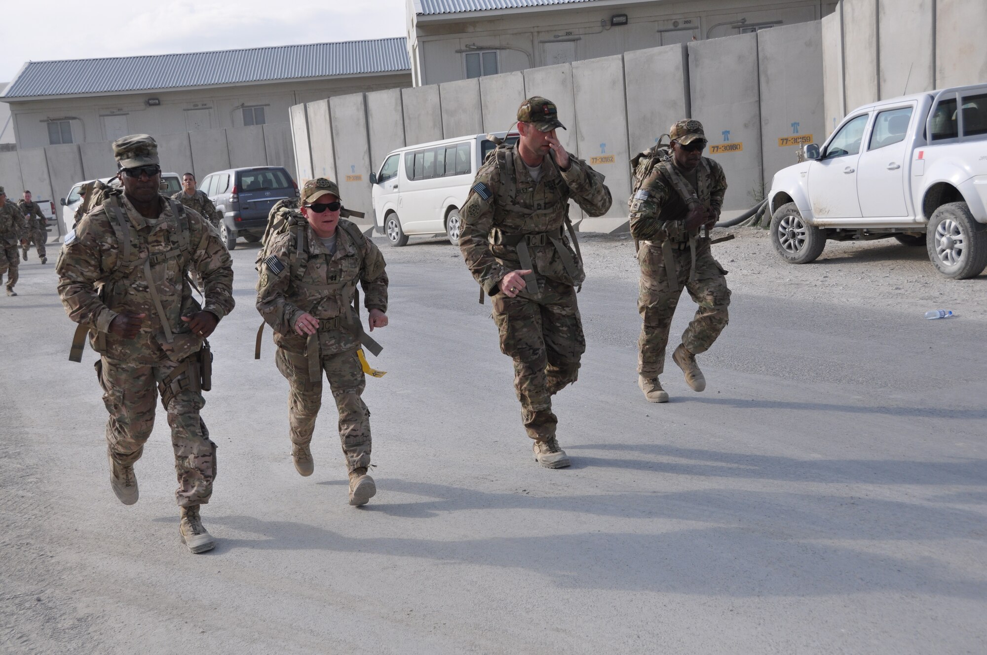 Ninety-two teams participated in the 5-kilometer ‘Got Consent?’ ruck march at Bagram Airfield, Afghanistan, Aug. 3, 2013. The event, hosted by the 455th Air Expeditionary Wing sexual assault response coordinator, was comprised of four-person teams who competed in the march carrying a 30-pound rucksack on their backs. (U.S. Air Force photo/Tech. Sgt. Rob Hazelett)