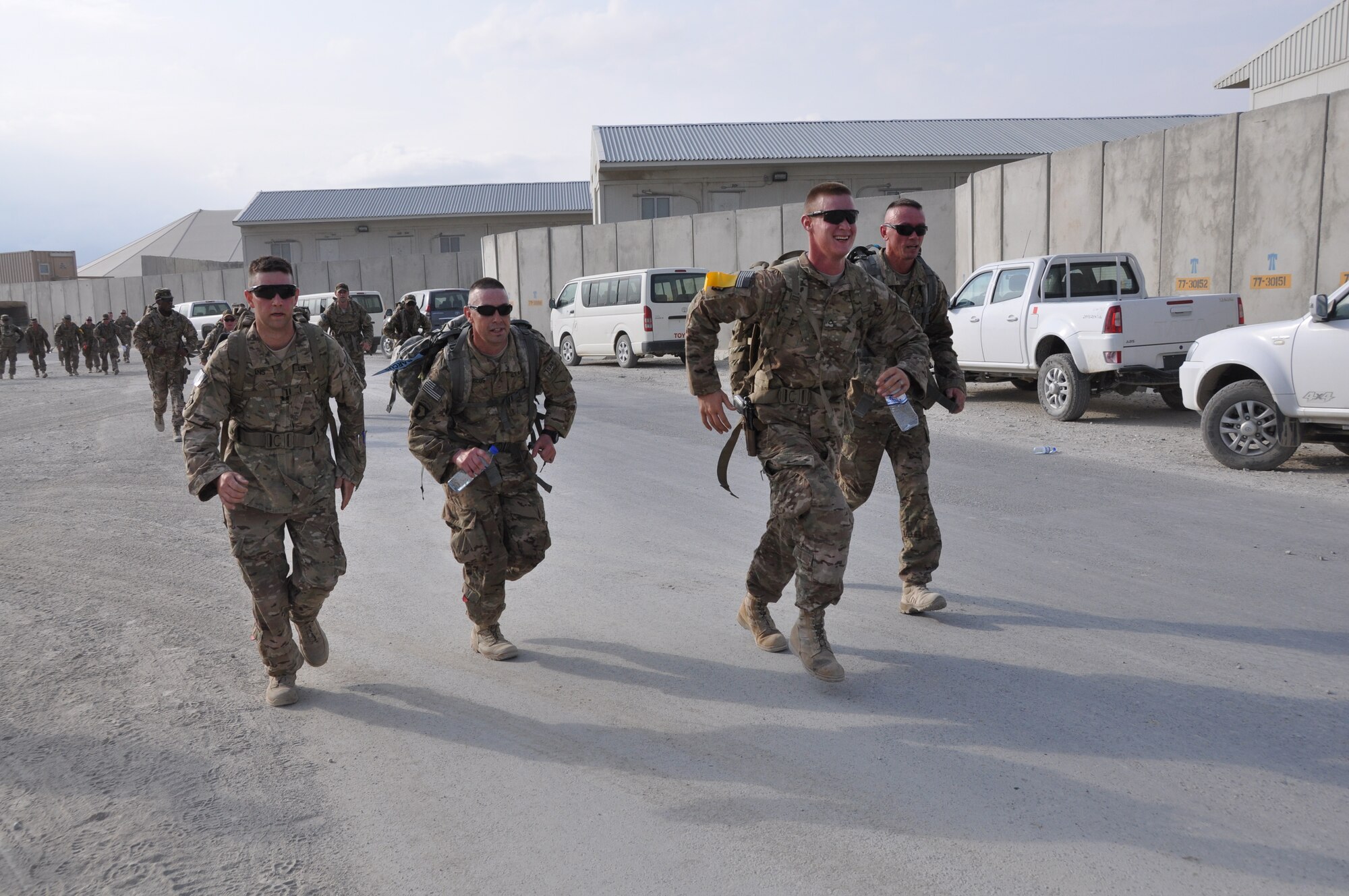 Ninety-two teams participated in the 5-kilometer ‘Got Consent?’ ruck march at Bagram Airfield, Afghanistan, Aug. 3, 2013. The event, hosted by the 455th Air Expeditionary Wing sexual assault response coordinator, was comprised of four-person teams who competed in the march carrying a 30-pound rucksack on their backs. (U.S. Air Force photo/Tech. Sgt. Rob Hazelett)