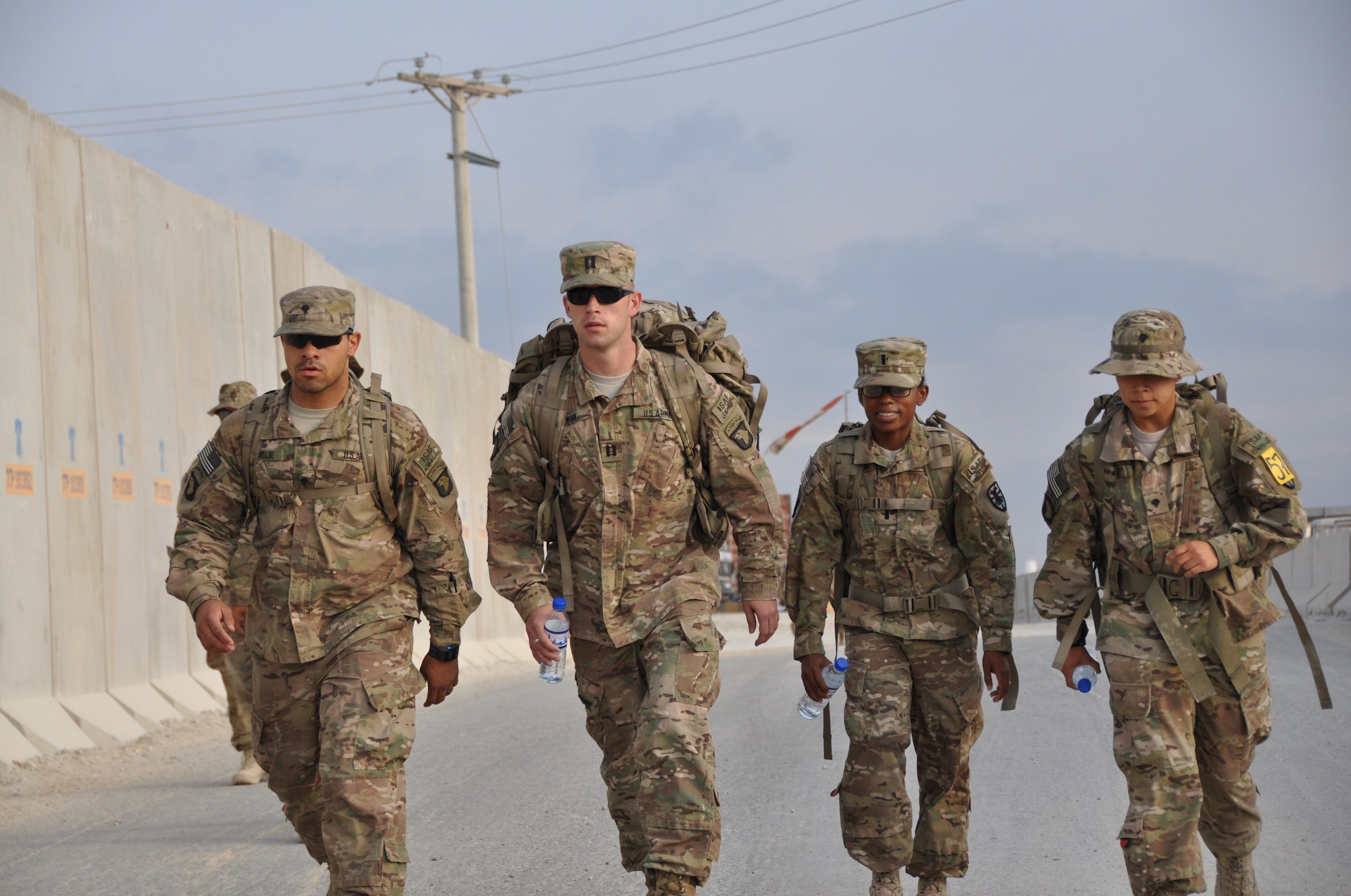 Ninety-two teams participated in the 5-kilometer ‘Got Consent?’ ruck march at Bagram Airfield, Afghanistan, Aug. 3, 2013. The event, hosted by the 455th Air Expeditionary Wing sexual assault response coordinator, was comprised of four-person teams who competed in the march carrying a 30-pound rucksack on their backs. (U.S. Air Force photo/Tech. Sgt. Rob Hazelett)