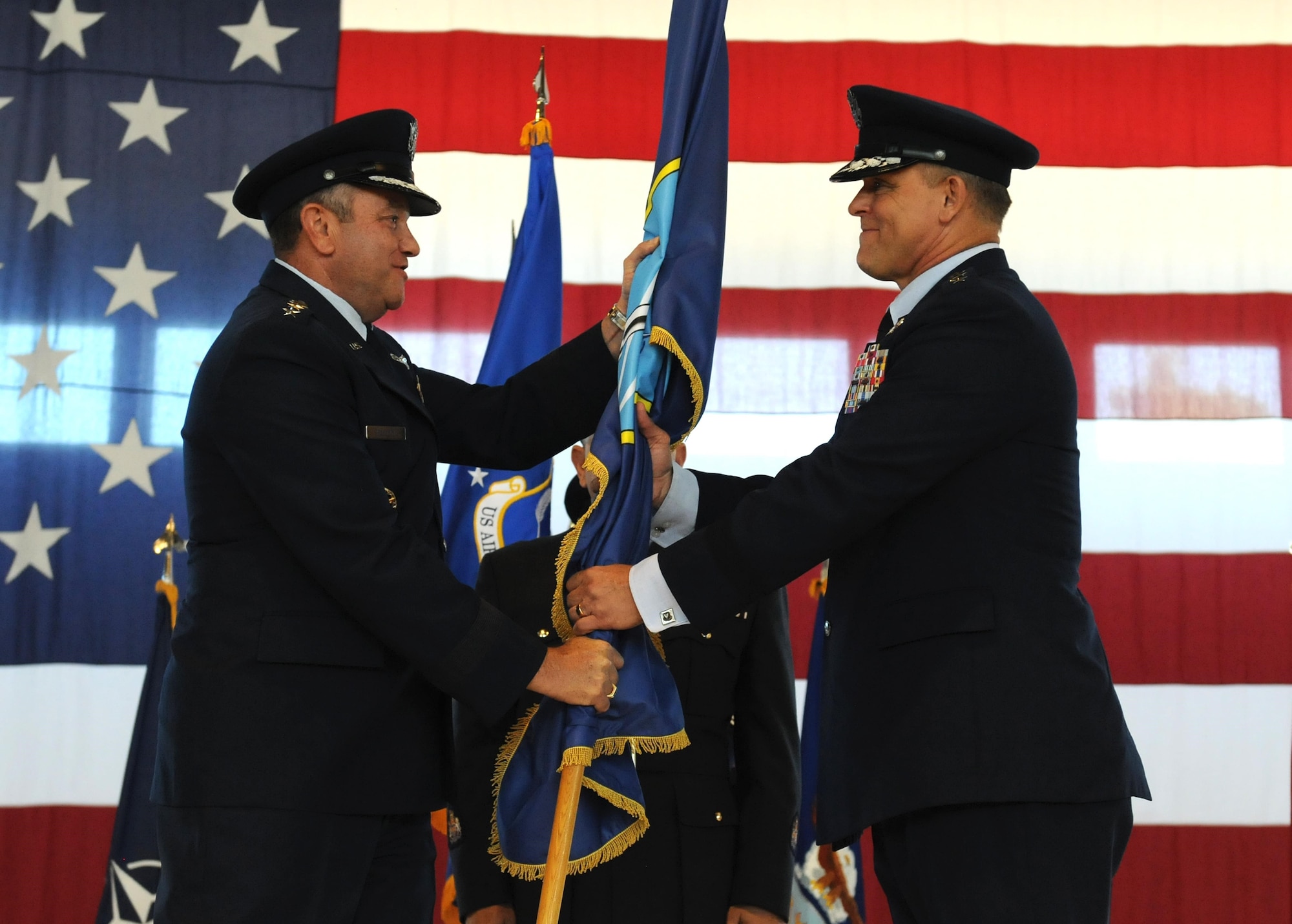 Gen. Philip M. Breedlove, U.S. European Command commander and NATO Supreme Allied Commander Europe (left), gives Gen. Frank Gorenc the command of Allied Air Command during an assumption of command ceremony at Ramstein Air Base, Germany, Aug. 2, 2013. (U.S. Air Force photo/Airman 1st Class Holly Mansfield)