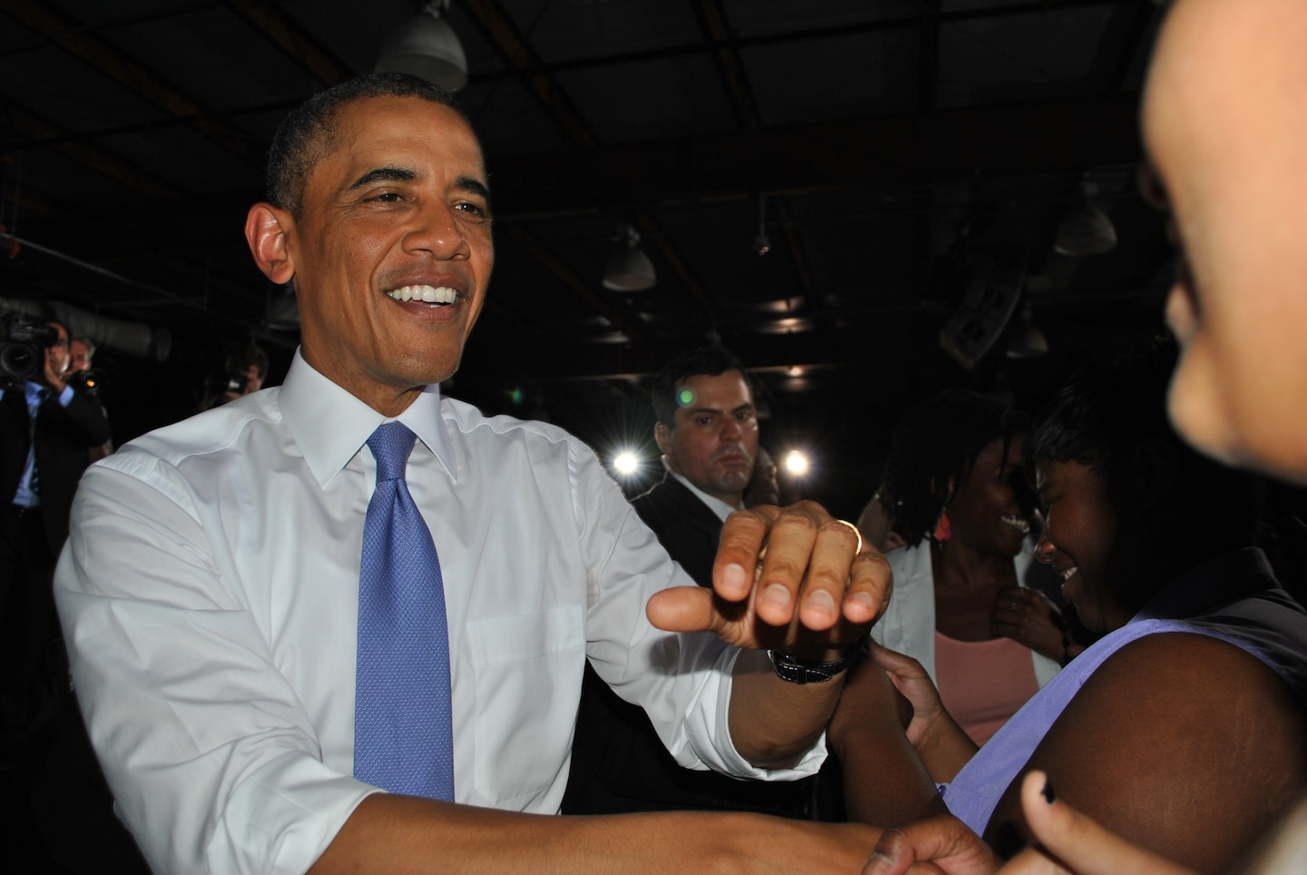 President Obama greets members of a standing-room-only audience at JAXPORT July 25. 
