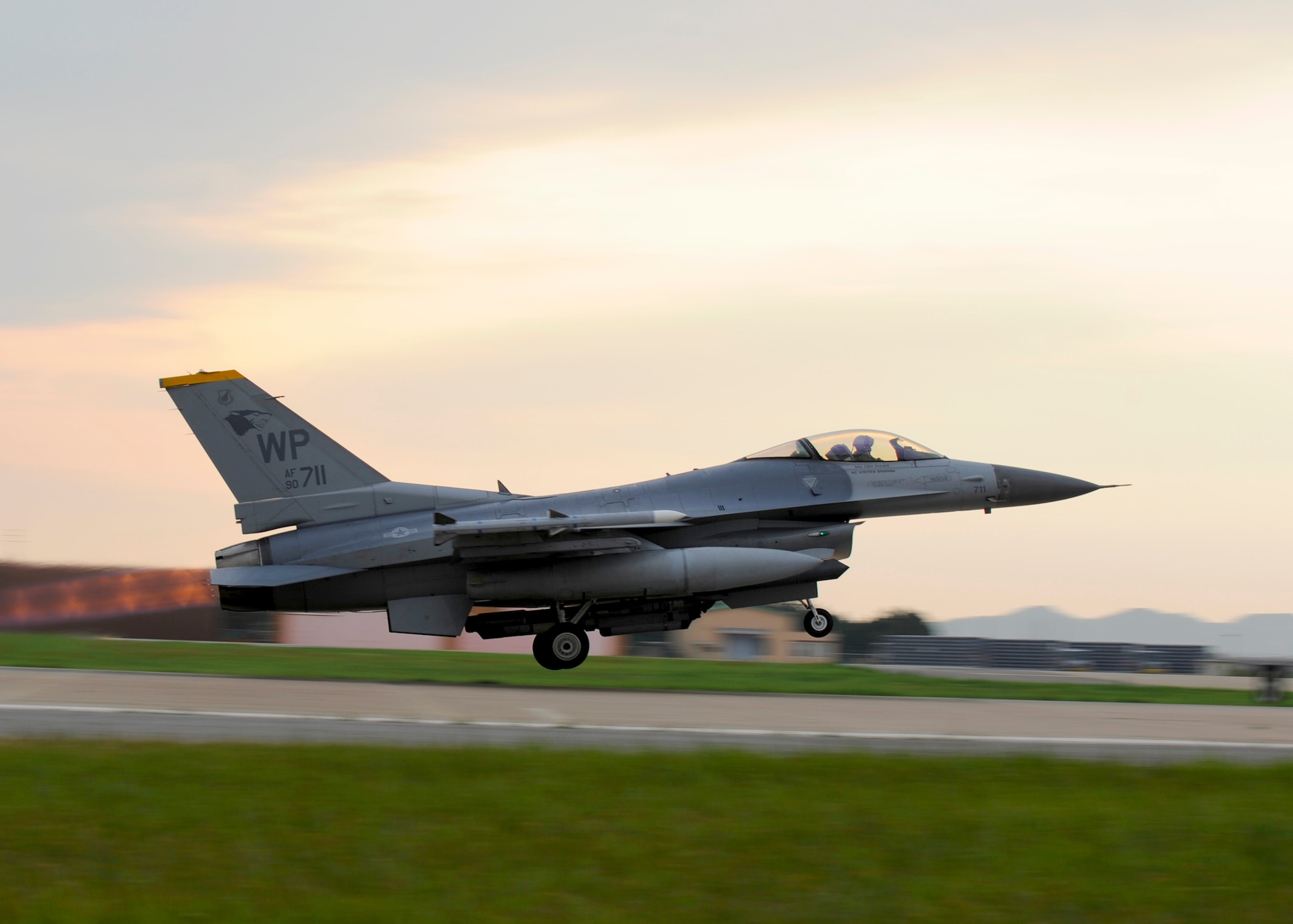 KUNSAN AIR BASE, Republic of Korea -- An F-16 Fighting Falcon with the 80th Fighter Squadron takes off during exercise Beverly Midnight 13-3 Aug. 6, 2013. This was one of the first flights for BM 13-3 and tests the capabilities of ground and aircrew during a wartime scenario. (U.S. Air Force photo by Staff Sgt. Jessica Haas/Released)