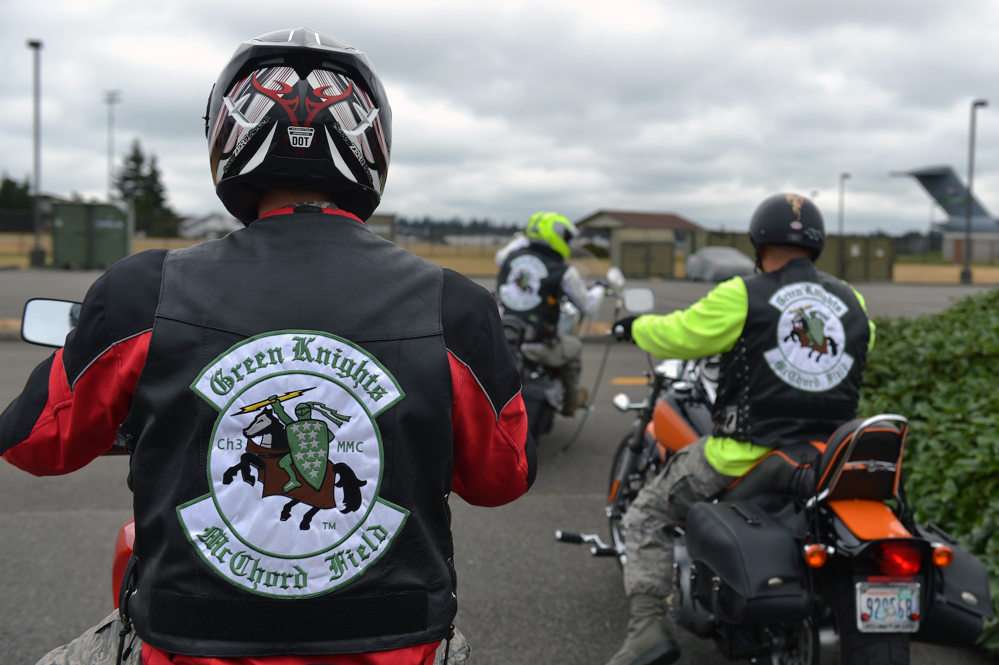 Airman 1st Class Orrin Fenwick, 62nd Aircraft Maintenance Squadron crew chief and member of the Green Knights Military Motorcycle Club Chapter 3, follows fellow members during a ride Aug. 1, 2013 at Joint Base Lewis-McChord, Wash. Originally established in 2000 to help promote motorcycle safety and fight for rider‘s rights, GKMMC Chapter 3 is one of the first established chapters of 113 chapters at different U.S. military bases worldwide. (U.S. Air Force photo/Airman 1st Class Jacob Jimenez)