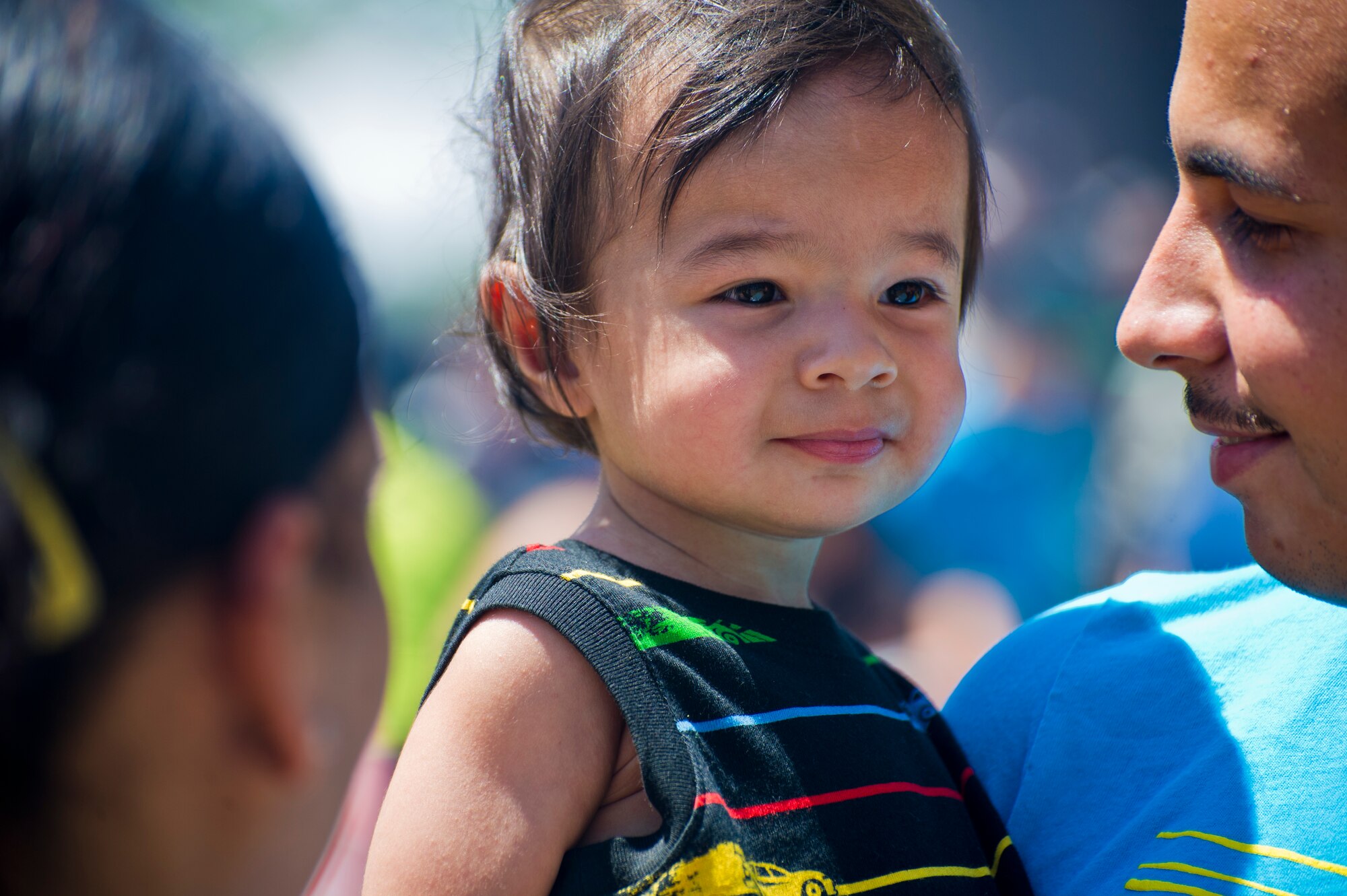A family enjoys themselves during Cannon Appreciation Day at Cannon Air Force Base, N.M., Aug. 2, 2013. The Clovis/Curry County Chamber of Commerce, Committee of Fifty and the Clovis Industrial Development Corporation came together to sponsor the event for members of the Cannon community. (U.S. Air Force photo/by Airman 1st Class Xavier Lockley)