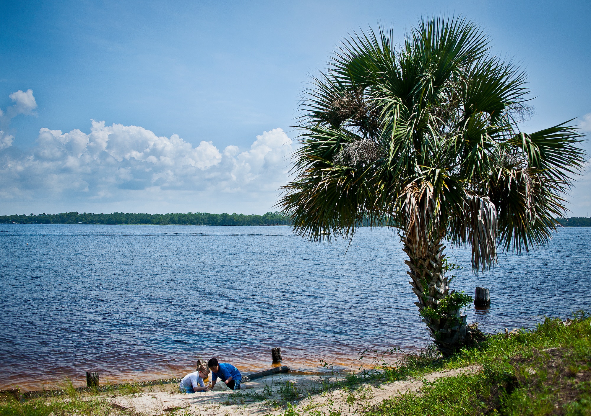 Two friends build a sandcastle together at Post’l Point at Eglin Air Force Base, Fla., Aug. 2.  Eglin offers many outdoor recreation gear and activities to enjoy.  For more information, or to see what’s available go to www.eglinforcesupport.com. (U.S. Air Force photo/Samuel King Jr.)