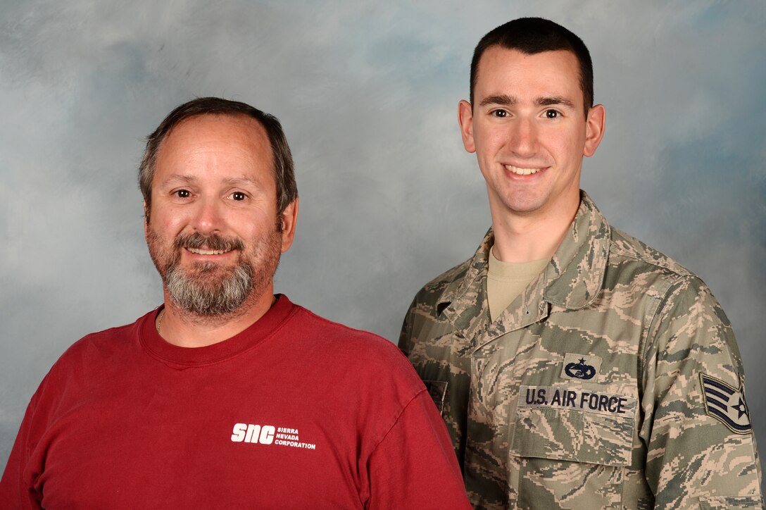 Randy Germain, a retired U.S. Air Force petroleum, oils and lubricants technician, and his son, U.S. Air Force Staff Sgt. Ronald Germain, 27th Special Operations Logistics Readiness Squadron traffic management office, come from a family with an extensive military background.  The father and son duo currently work within the same squadron, the 27 SOLRS, at Cannon Air Force Base, N.M.   (U.S. Air Force photo/Staff Sgt. Matthew Plew) 