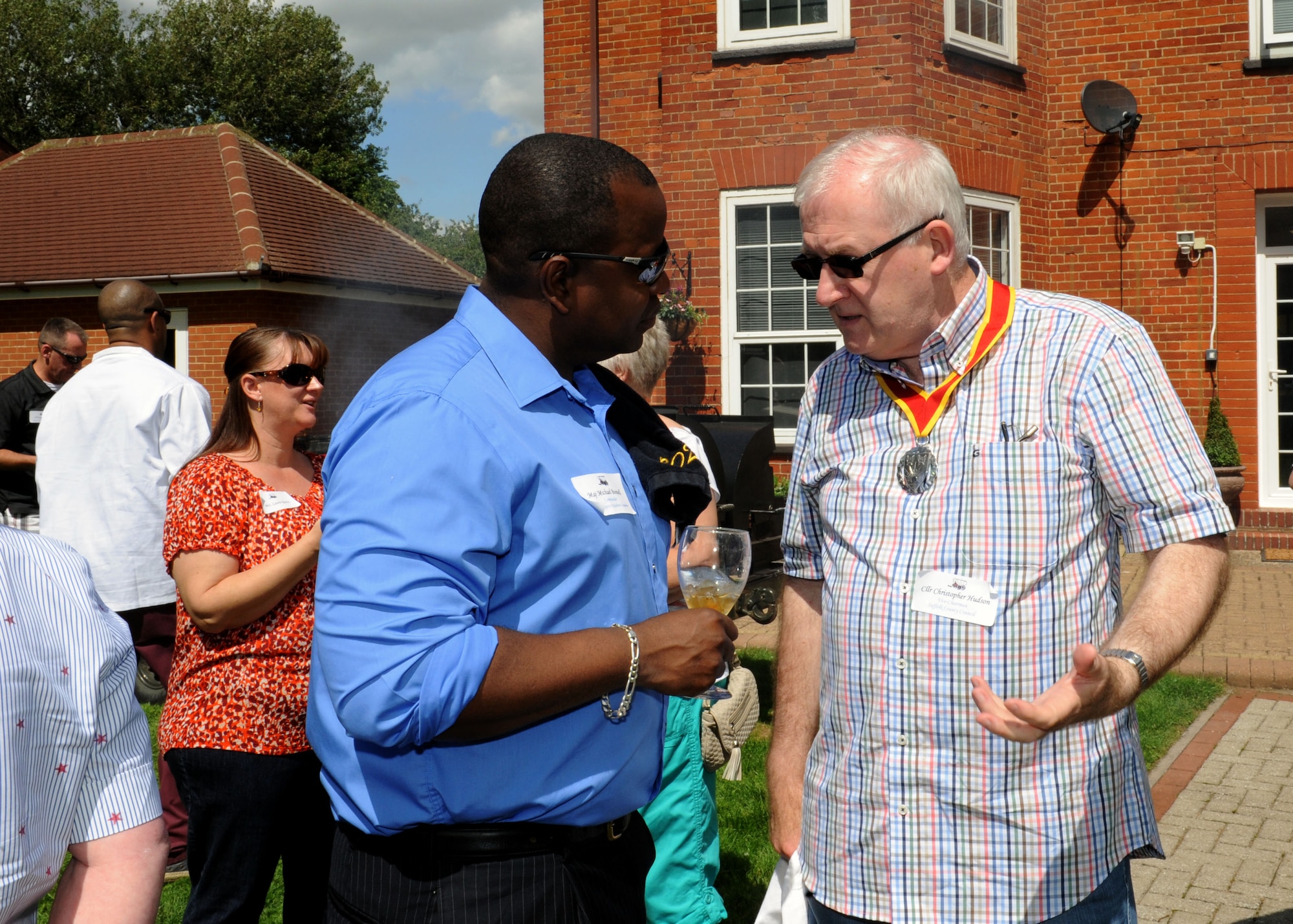 From left, Maj. Michael Boswell, 100th Logistics Readiness Squadron commander, and Councillor Christopher Hudson, Suffolk County Council vice chairman, chat Aug. 3, 2013, at the New Mayors’ Barbecue on RAF Mildenhall, England. Before lunch, Col. Kenneth T. Bibb Jr., 100th Air Refueling Wing commander, briefed to local community leaders on several topics ranging from the economic effect Airmen have on the community to the history of the RAF Mildenhall. The event informed local community leaders about the base and gave them a chance to get to know base leadership personally. (U.S. Air Force photo by Airman 1st Class Preston Webb/Released)