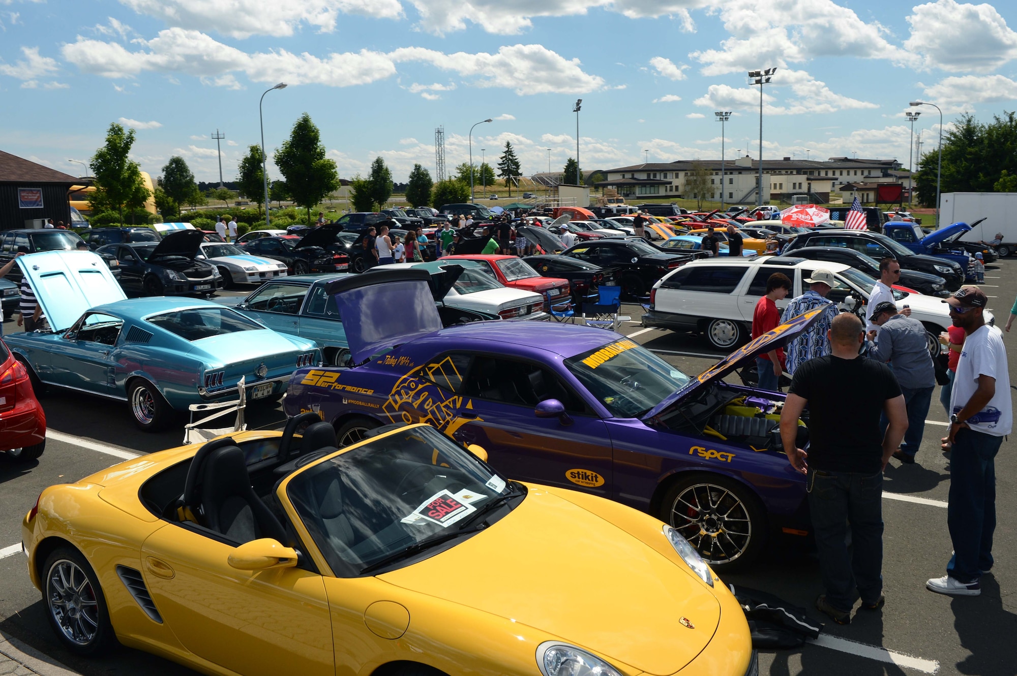 SPANGDAHLEM AIR BASE, Germany – Cars are displayed in a parking lot at the base pavilion in the 12th annual Motor Weekend car competition Aug. 4, 2013. The competition was judged in three main categories of cars, trucks and motorcycles . (U.S. Air Force photo by Airman 1st Class Kyle Gese/Released)