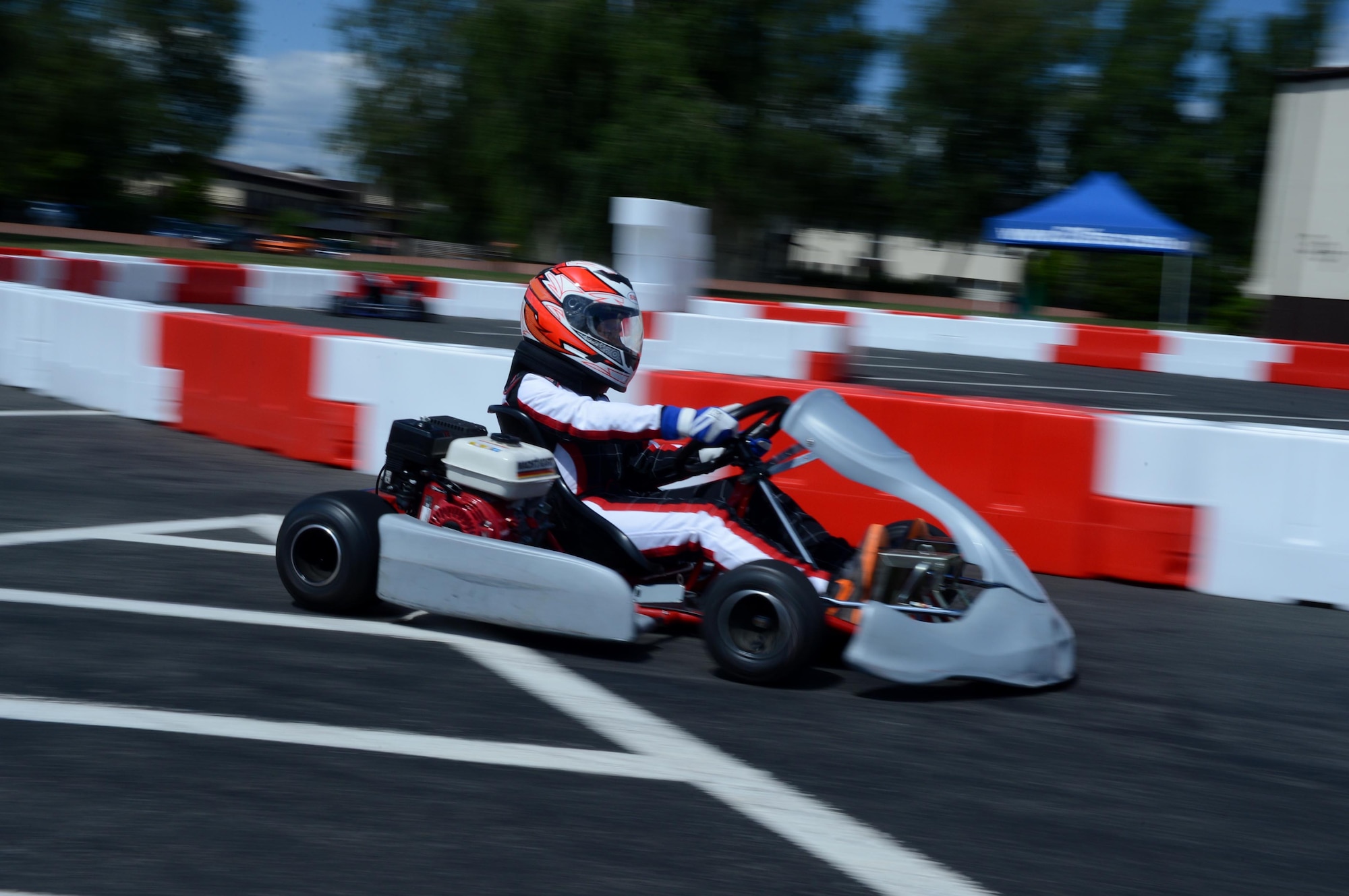 SPANGDAHLEM AIR BASE, Germany – Holden McGrew son of Master Sgt. Thomas McGrew, 52nd Civil Engineer Squadron from Olaton Ky., drives a gas powered go-cart at the 12th annual Motor Weekend, Aug. 4, 2013. Some of the events throughout the day included a car competition, go-carts, live music, paintball and demonstrations from security forces and the fire department. (U.S. Air Force photo by Airman 1st Class Kyle Gese)