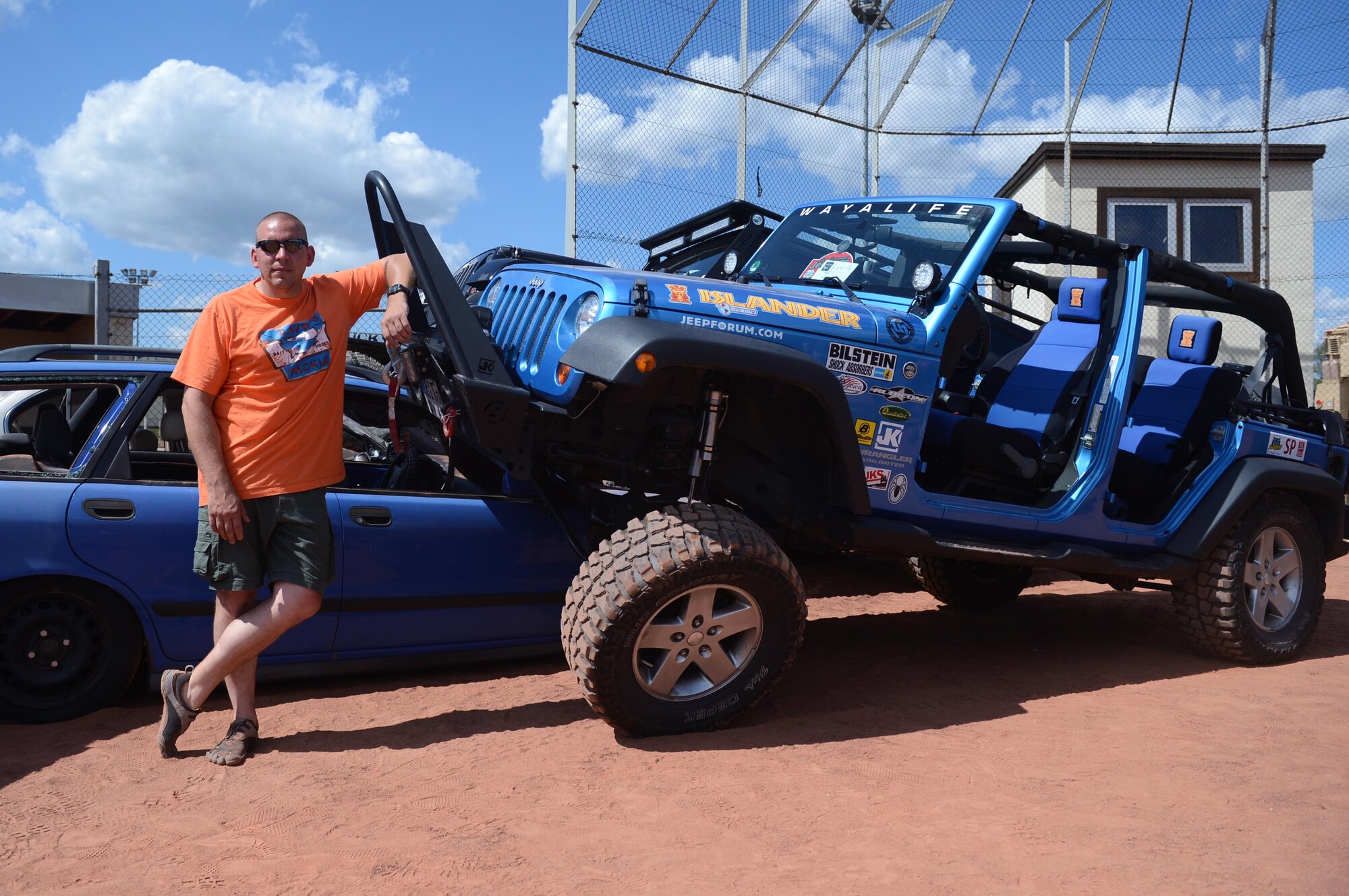 SPANGDAHLEM AIR BASE, Germany – U.S. Air Force Master Sgt. Mark Cutler, 52nd Comptroller Squadron-Wing Staff Agency first sergeant, stands next to his 2010 Jeep Wrangler, Aug. 4, 2013. Cutler displayed his Jeep in the 12th annual Motor Weekend event hosted by the 52nd Force Support Squadron. (U.S. Air Force photo by Airman 1st Class Kyle Gese/Released)