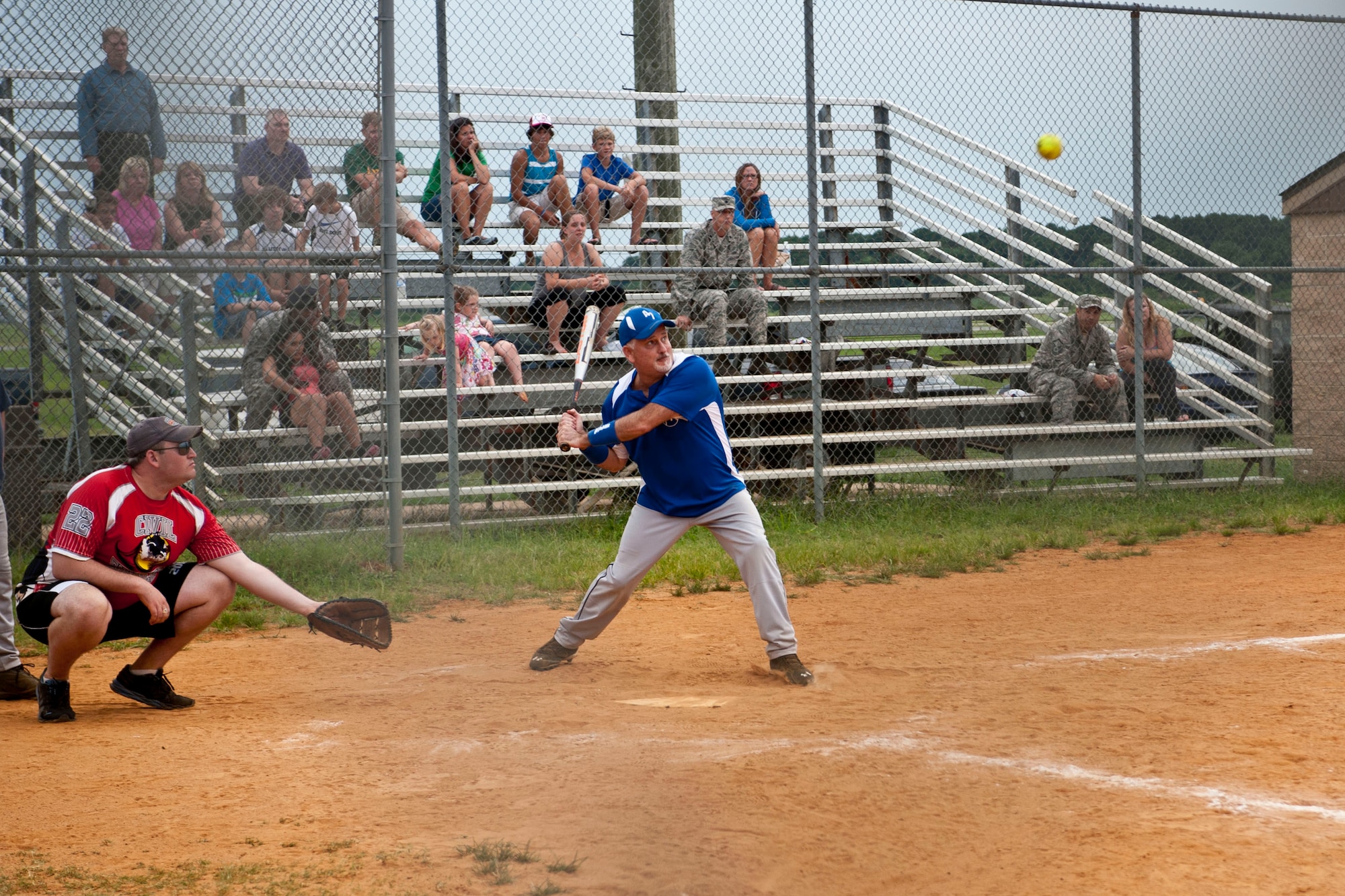 Philip Nease, Air Combat Command Installations and Missions Support Directorate contracting officer, prepares to swing during the intramural softball championship at Langley Air Force Base, Va., July 31, 2013. Nease is an active softball player and has participated with the team since 2008. (U.S. Air Force photo by Staff Sgt. Stephanie Rubi/Released)