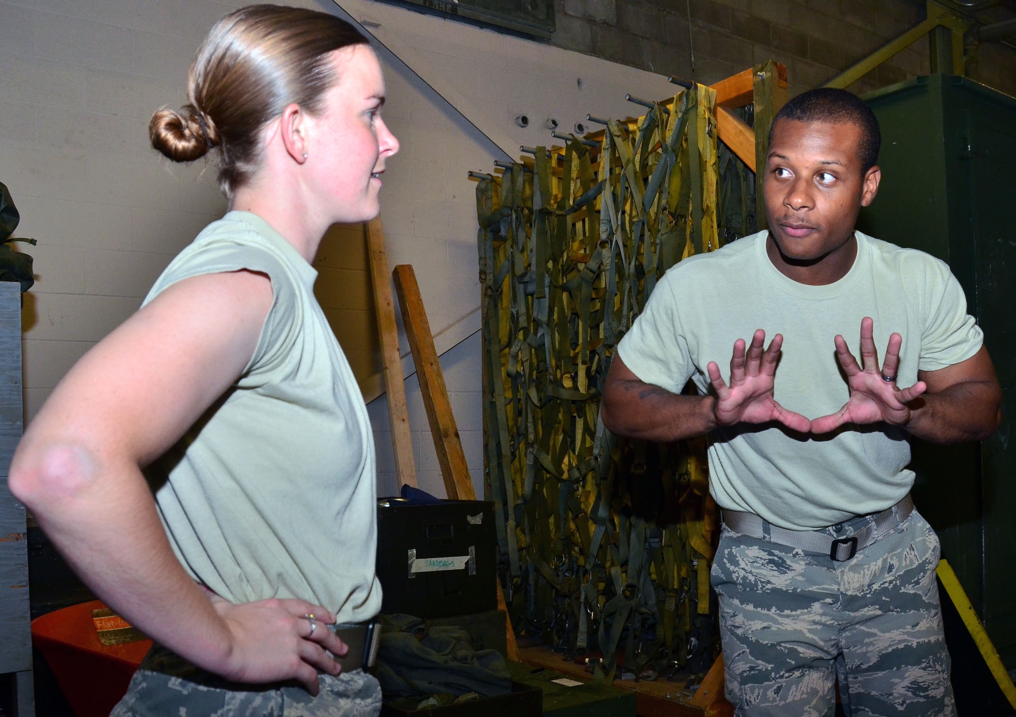 WRIGHT-PATTERSON AIR FORCE BASE, Ohio - Staff Sgt Dawn Gettys, 445th Security Forces Squadron, learns new combative techniques from Staff Sgt. Dorian White, 445 SFS, during the July 13 unit training assembly. This training is specifically for SFS and is different from Army and Air Force combative training. (U.S. Air Force photo/Staff Sgt. Amanda Duncan)
