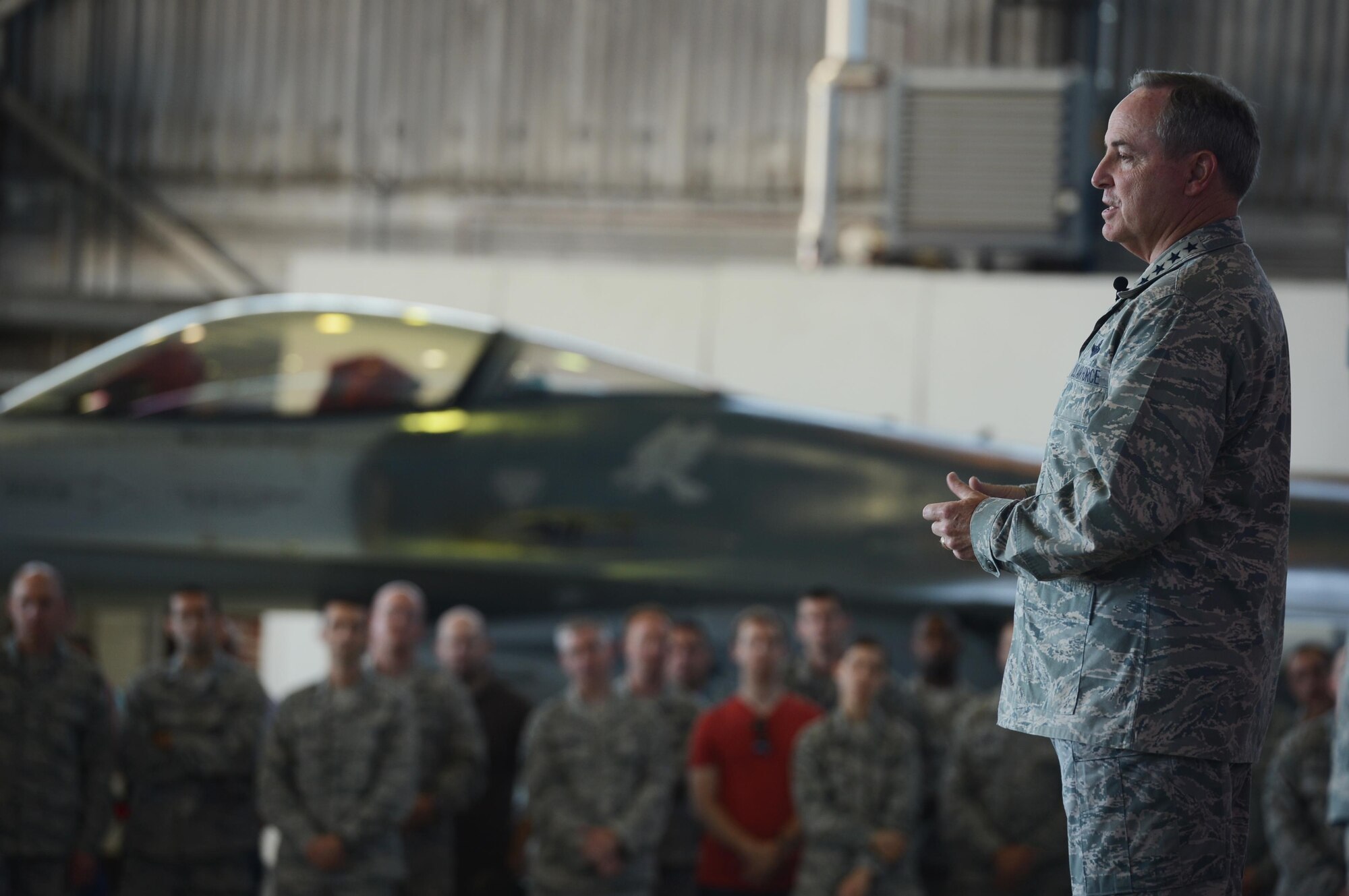 Air Force Chief of Staff Gen. Mark A. Welsh III speaks to Spangdahlem Airmen during an Airman’s call in Hanger 1, Aug. 1, 2013. Welsh and Chief Master Sgt. of the Air Force James Cody visited Spangdahlem Air Base to thank Airmen and their families for their service and dedication, as well as address current challenges facing the Air Force.