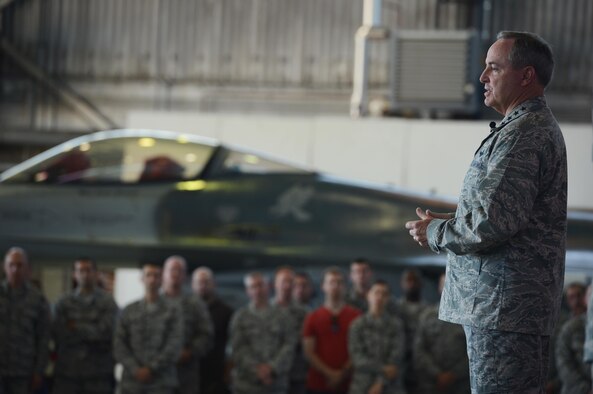 Air Force Chief of Staff Gen. Mark A. Welsh III speaks to Spangdahlem Airmen during an Airman’s call in Hanger 1, Aug. 1, 2013. Welsh and Chief Master Sgt. of the Air Force James Cody visited Spangdahlem Air Base to thank Airmen and their families for their service and dedication, as well as address current challenges facing the Air Force.