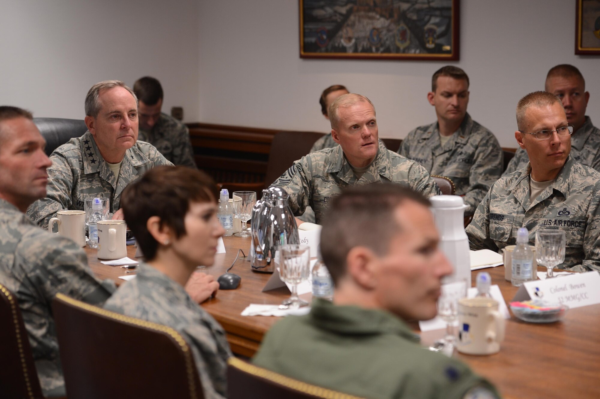Air Force Chief of Staff Gen. Mark A. Welsh III and Chief Master Sgt. of the Air Force James Cody receive a mission brief here Aug. 1. During their visit, Welsh and Cody had lunch with Airmen at the Mosel Dining Hall and hosted an Airman’s call to thank Airmen and their families for their service and dedication, as well as address current challenges facing the Air Force. 