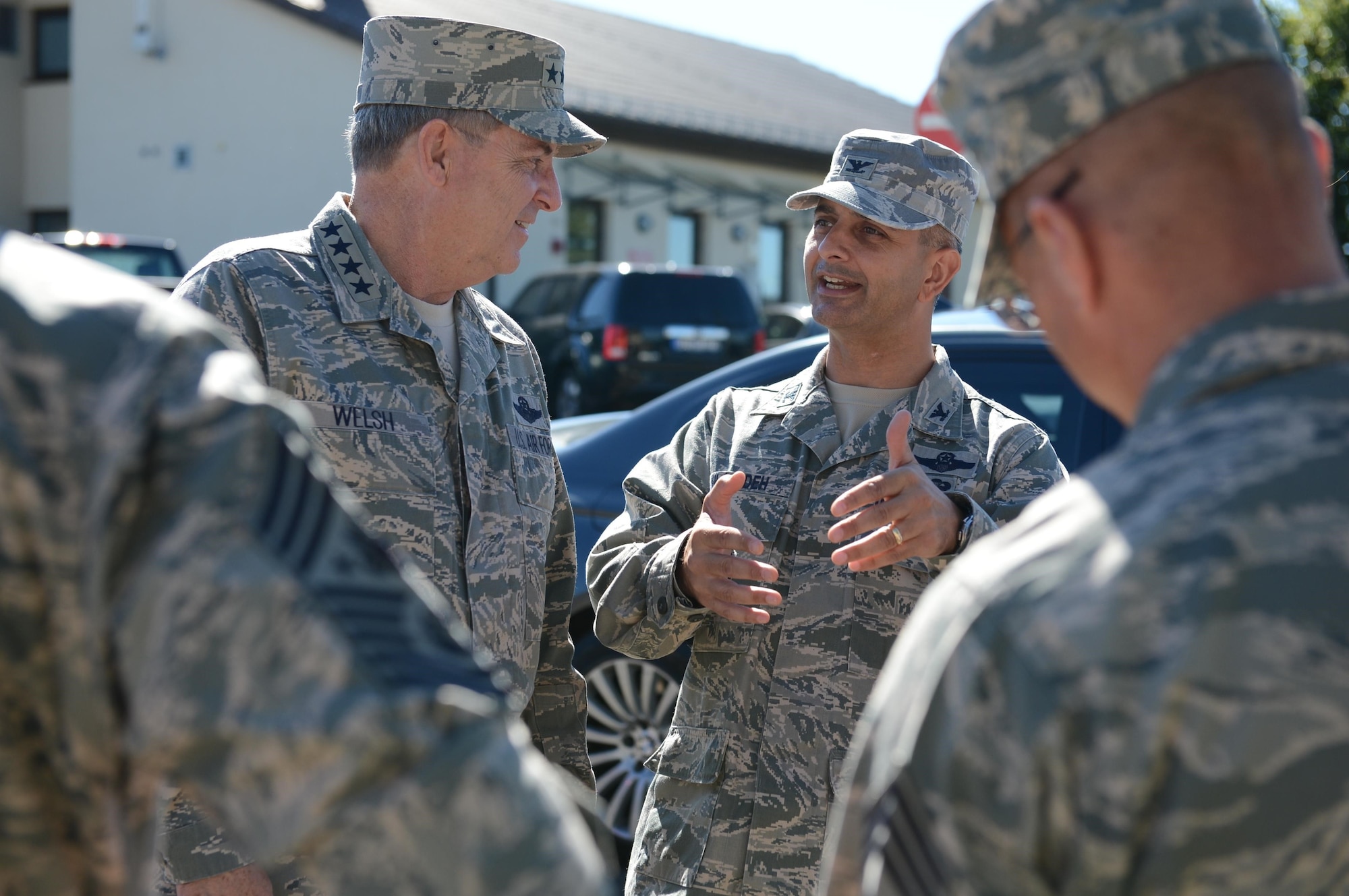 Col. David Julazadeh, 52nd Fighter Wing commander, welcomes Air Force Chief of Staff Gen. Mark A. Welsh III to Spangdahlem Air Base Aug. 1. This is the first time Welsh, Chief Master Sgt. of the Air Force James Cody and their spouses, Betty Welsh and Atheena Cody, visited the base together. During the visit, Welsh and Cody met with Airmen for lunch before hosting an Airman's call to thank Airmen and their families for their service and dedication, as well as address current challenges facing the Air Force. 