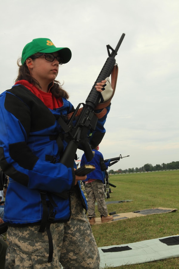 CAMP PERRY, Ohio – Mercedes Brandstetter, 15, of the Virginia Junior Marksmanship Program from Stafford, Va. prepares to send rounds downrange during the junior’s portion of the National Trophy Team Match here, July 31, 2013. The NTTM is part of the annual Civilian Marksmanship Program's National Matches, which have been taking place annually since 1903. (U.S. Marine Corps photo by Lance Cpl. Tiffany Edwards)