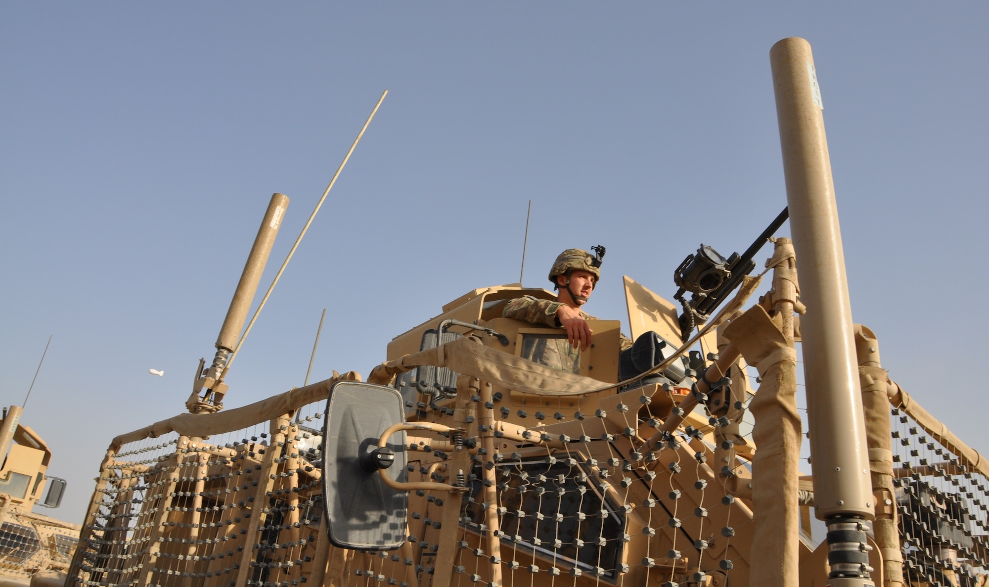 A crew member from the 755th Expeditionary Security Forces Squadron reapers team prepares to go out on a patrol July 31, 2013. The 455th Air Expeditionary Wing is supporting the Afghan National Security Forces as they continue taking the security lead in Parwan Province. By working with the Afghan National Army and Afghan National Police, security forces are able to build up the ANSF’s repertoire, expanding their capabilities during joint patrols.