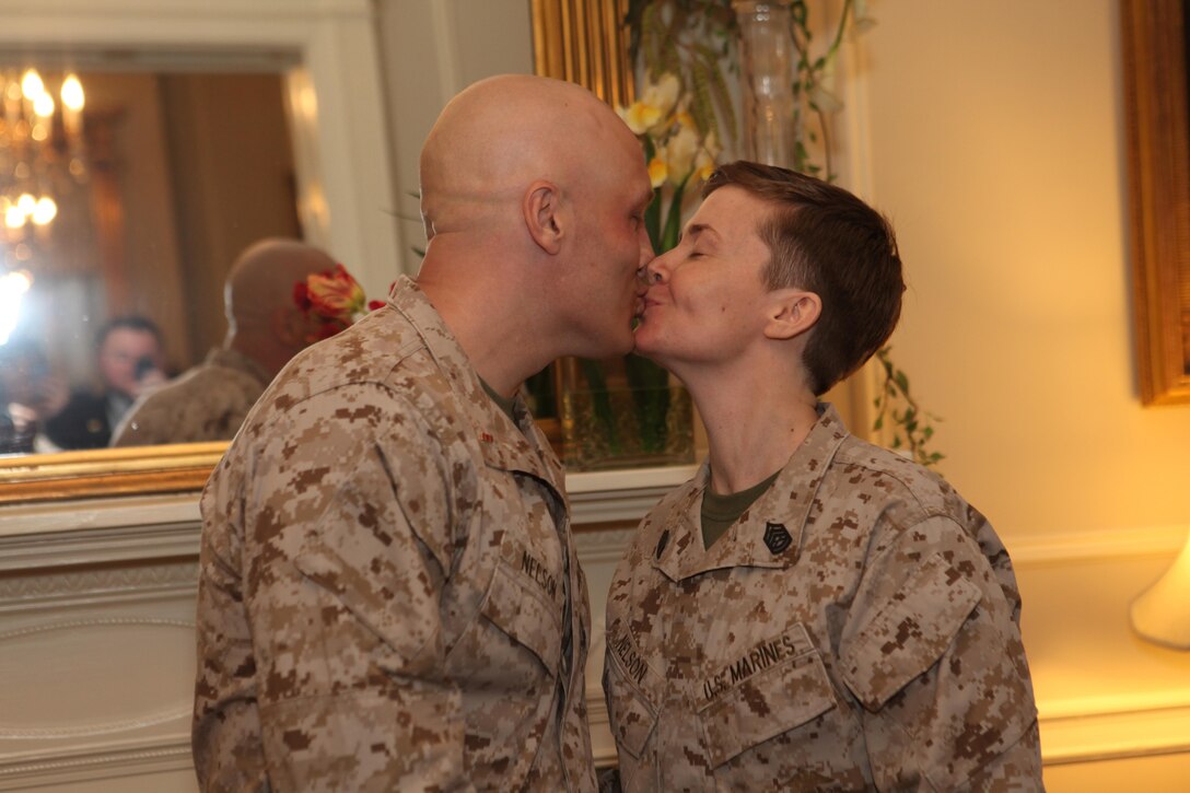 Gen. James F. Amos, the 35th Commandant of the Marine Corps, promotes Jody R. Nelson to the rank of Chief Warrant Officer 2 in the Home of the Commandants, Marine Barracks Washington, D.C., on Aug. 1, 2013. (U.S. Marine Corps photo by Sgt. Marionne T. Mangrum)
