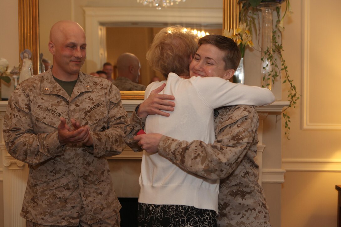 Gen. James F. Amos, the 35th Commandant of the Marine Corps, promotes Jody R. Nelson to the rank of Chief Warrant Officer 2 in the Home of the Commandants, Marine Barracks Washington, D.C., on Aug. 1, 2013. (U.S. Marine Corps photo by Sgt. Marionne T. Mangrum)