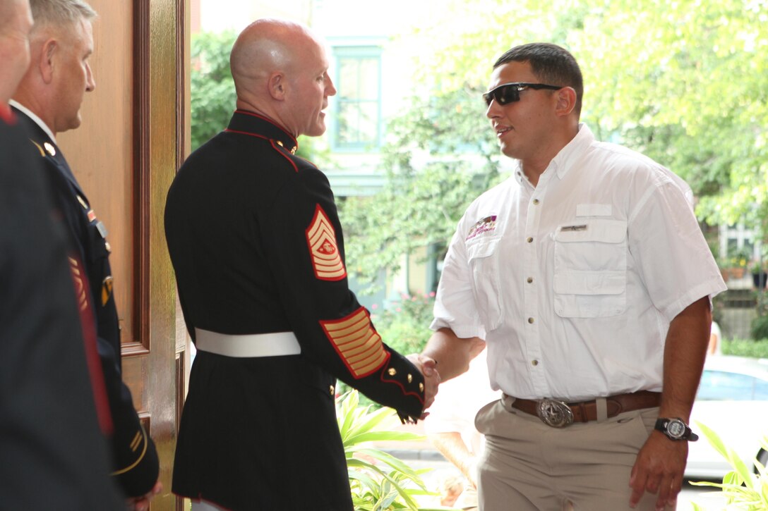 Sgt. Maj. Micheal P. Barrett, the 17th Sergeant Major of the Marine Corps, hosts a reception in honor of the 14th Sergeant Major of the Army Sgt. Maj. Raymond F. Chandler, the 13th Master Chief Petty Officer of the Navy Master Chief Petty Officer Michael D. Stevens, and the 4th Senior Enlisted Advisor for the National Guard Bureau Chief Master Sgt. Mitchell O. Brush at the Home of the Commandants, Marine Barracks Washington, D.C., on Aug. 2, 2013. (U.S. Marine Corps photo by Sgt. Marionne T. Mangrum)