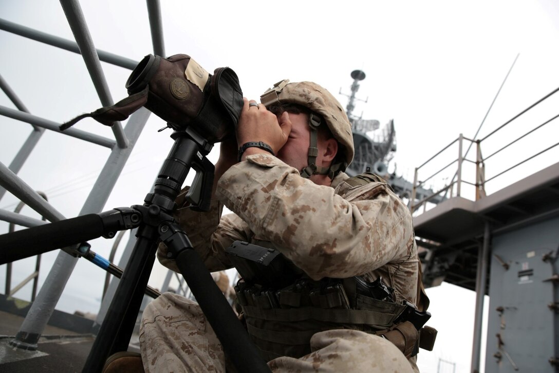 130711-M-OH054-233

PACIFIC OCEAN ABOARD USS HARPERS FERRY (LSD-49) – Lance Cpl. Dylan Tomlinson, a scout sniper with Scout Sniper Platoon, Weapons Company, Battalion Landing Team 1/4, 13th Marine Expeditionary Unit and Springfield, Tenn. native, provides observation support during Small Craft Action Team (SCAT) training as part of Composite Training Unit Exercise aboard USS Harpers Ferry (LSD-49), July 11, 2013. The purpose of this drill was to utilize Navy and Marine Corps personnel to maintain a defensive posture against possible threats from small boats. Composite Training Unit Exercise (COMTUEX) is scenario driven exercise aimed at integrating the 13th MEU and the ships of the Boxer Amphibious Ready Group through simulated real-world operational events. (U.S. Marine Corps photo by Sgt. Christopher O’Quin/Released)