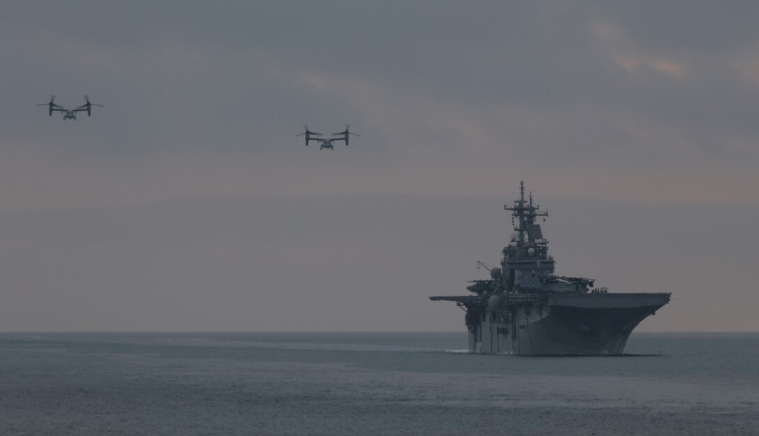 130711-M-OH054-490

PACIFIC OCEAN ABOARD USS HARPERS FERRY (LSD-49) – MV-22B “Ospreys” belonging to Marine Medium Titlrotor Squadron 166 (Reinforced), 13th Marine Expeditionary Unit prepare to land aboard USS Boxer (LHD-4) during flight operations as part of Composite Training Unit Exercise, July 11, 2013. Composite Training Unit Exercise (COMTUEX) is scenario driven exercise aimed at integrating the 13th MEU and the ships of the Boxer Amphibious Ready Group through simulated real-world operational events. (U.S. Marine Corps photo by Sgt. Christopher O’Quin/Released)