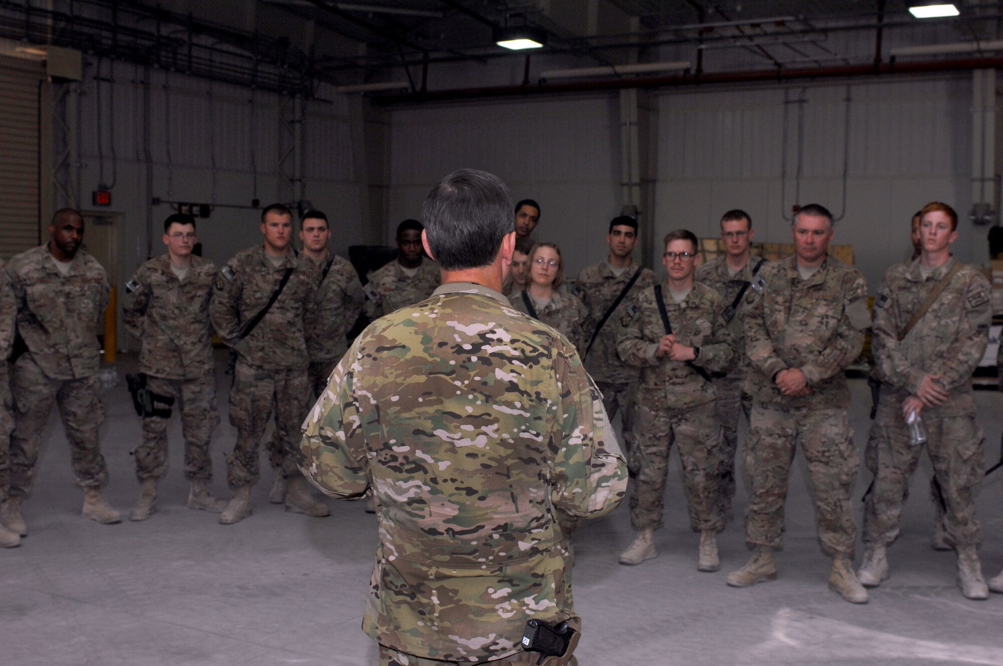 Lt. Gen. John Hesterman III, commander, U.S. Air Forces Central Command, talks with a group of Airmen from the 451st Expeditionary Logistics Readiness Squadron at Kandahar Airfield, Afghanistan, July 28, 2013. Hesterman made his first visit to KAF as the AFCENT commander. (U.S. Air Force photo/Senior Airman Jack Sanders)