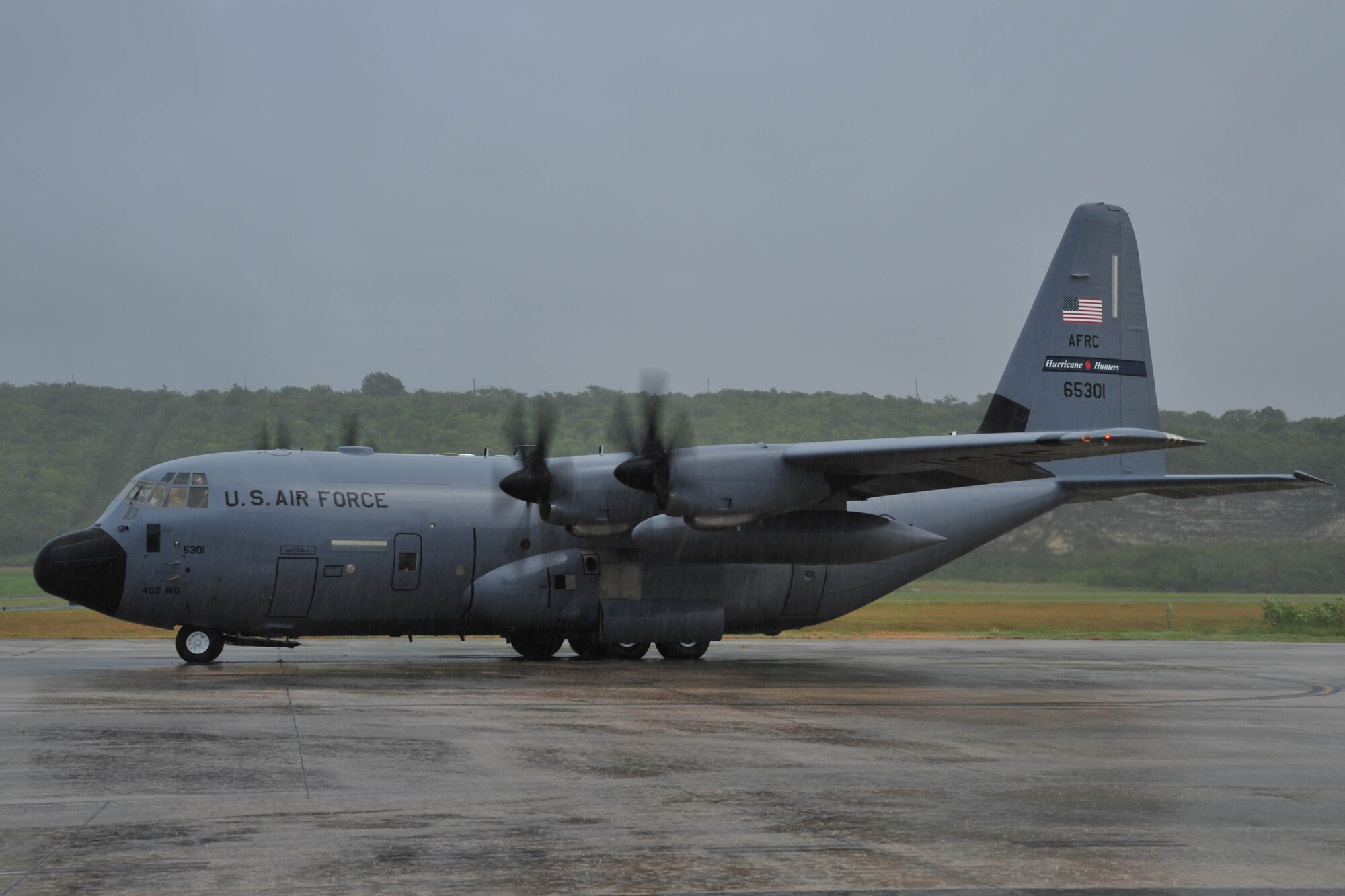 A WC-130J aircraft from the 53rd Weather Reconnaissance Squadron prepares to taxi onto the runway before its flight into the remnants of Dorian July 28, 2013. Hurricane Hunter aircrews and other 403rd Wing members deploy to several locations in the United States and Pacific and Atlantic Oceans to fly storm missions during the hurricane season, which officially starts June 1 and ends November 30 each year. (U.S. Air Force photo/Tech. Sgt. Ryan Labadens)