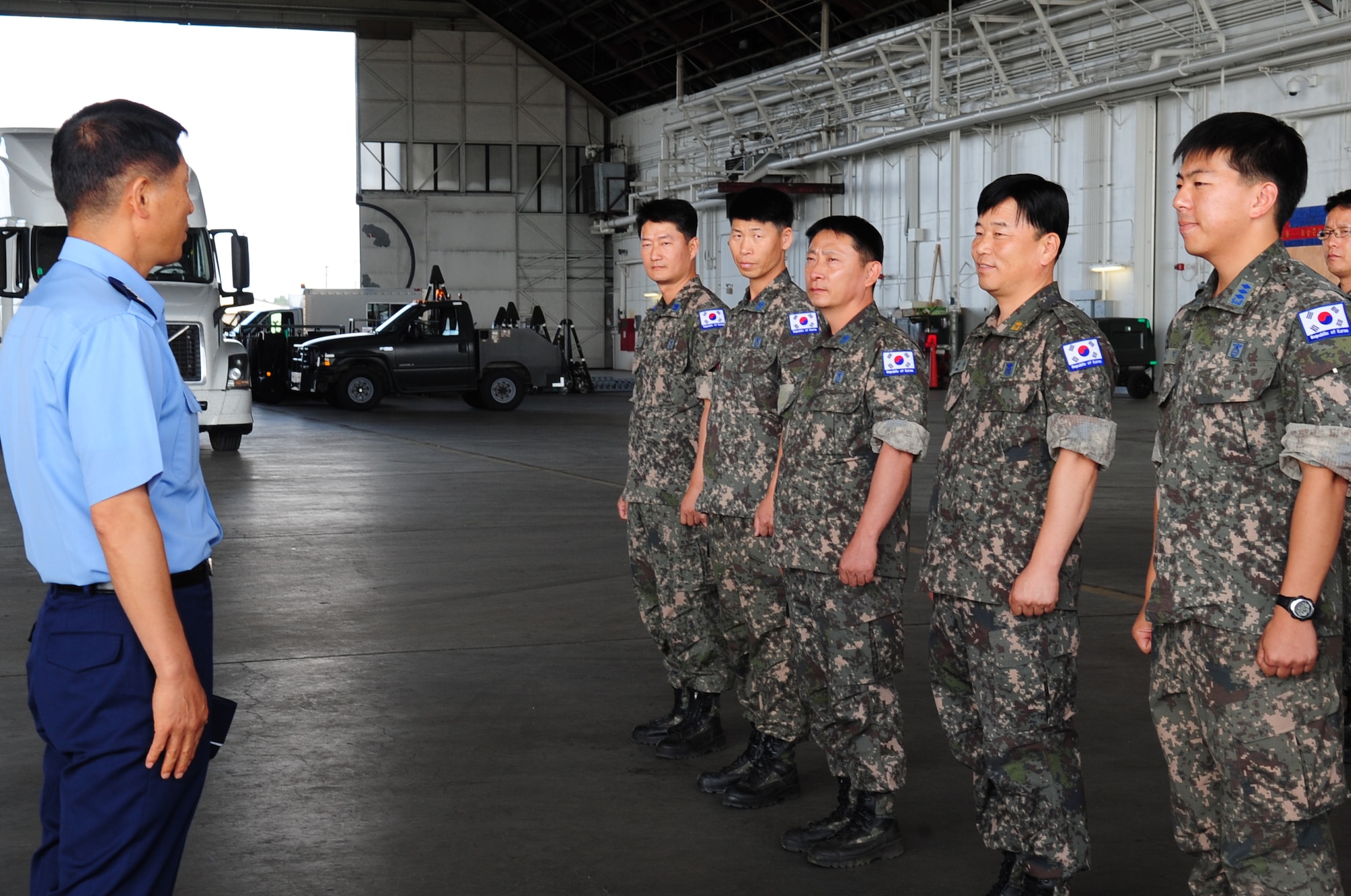 Gen. Ilhwan Sung, Republic of Korea Air Force chief of staff, gives a morale speech to his airmen Aug. 5, 2013, Eielson Air Force Base, Alaska. Sung visited the base to tour RED FLAG-Alaska facilities prior to the Republic of Korea for the first time participating in the two week exercise. (U.S. Air Force photo by Airman 1st Class Lauren-Taylor Levin/Released)