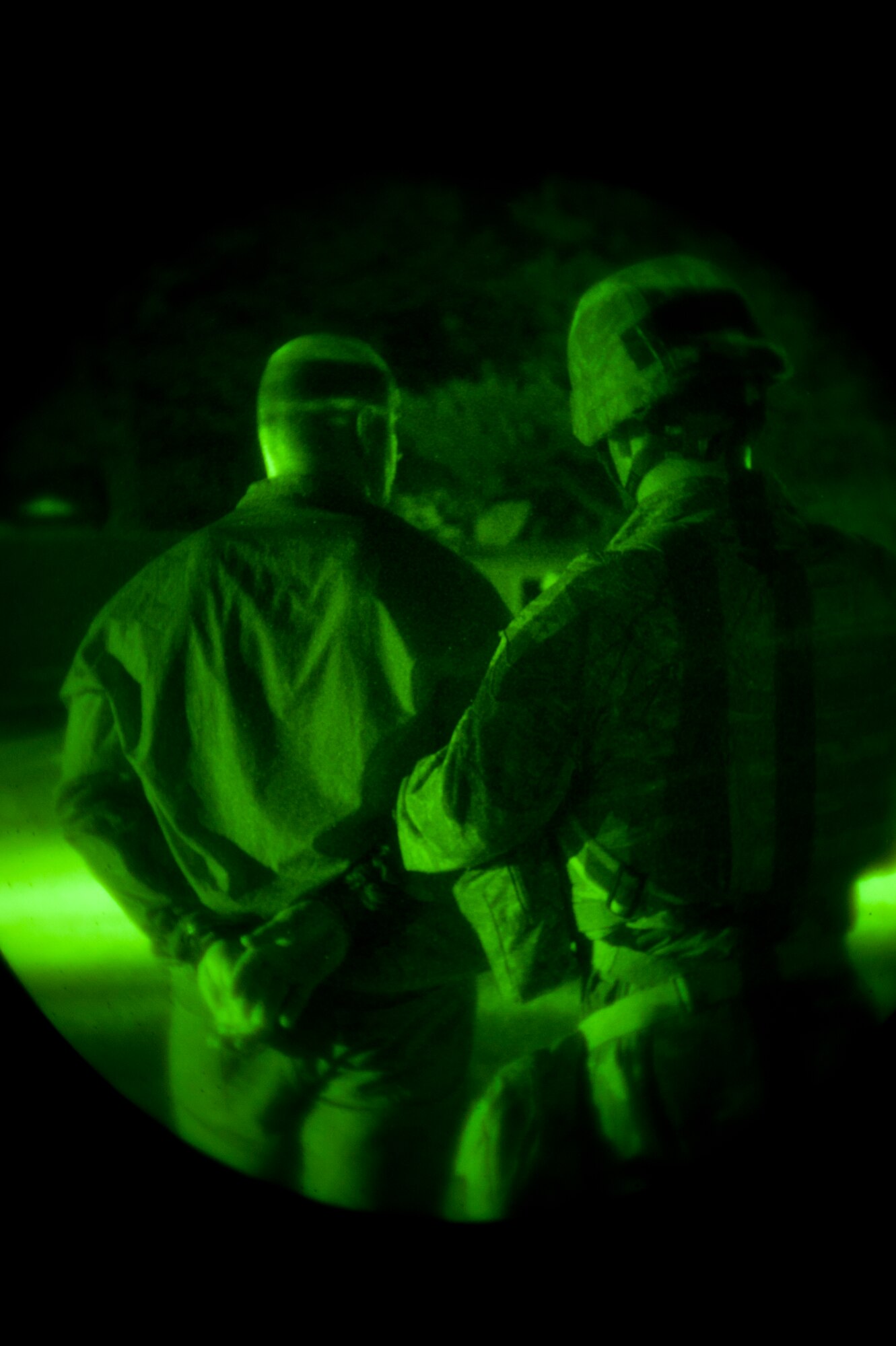 KUNSAN AIR BASE, Republic of Korea -- Airman 1st Class Anthony Kelly, 8th Security Forces Squadron, maintains control of a “captive” during exercise Beverly Midnight 13-3, Aug. 7, 2013. The captive was gained during a simulated ground attack on the base. (U.S. Air Force photo by Senior Airman Clayton Lenhardt/Released)