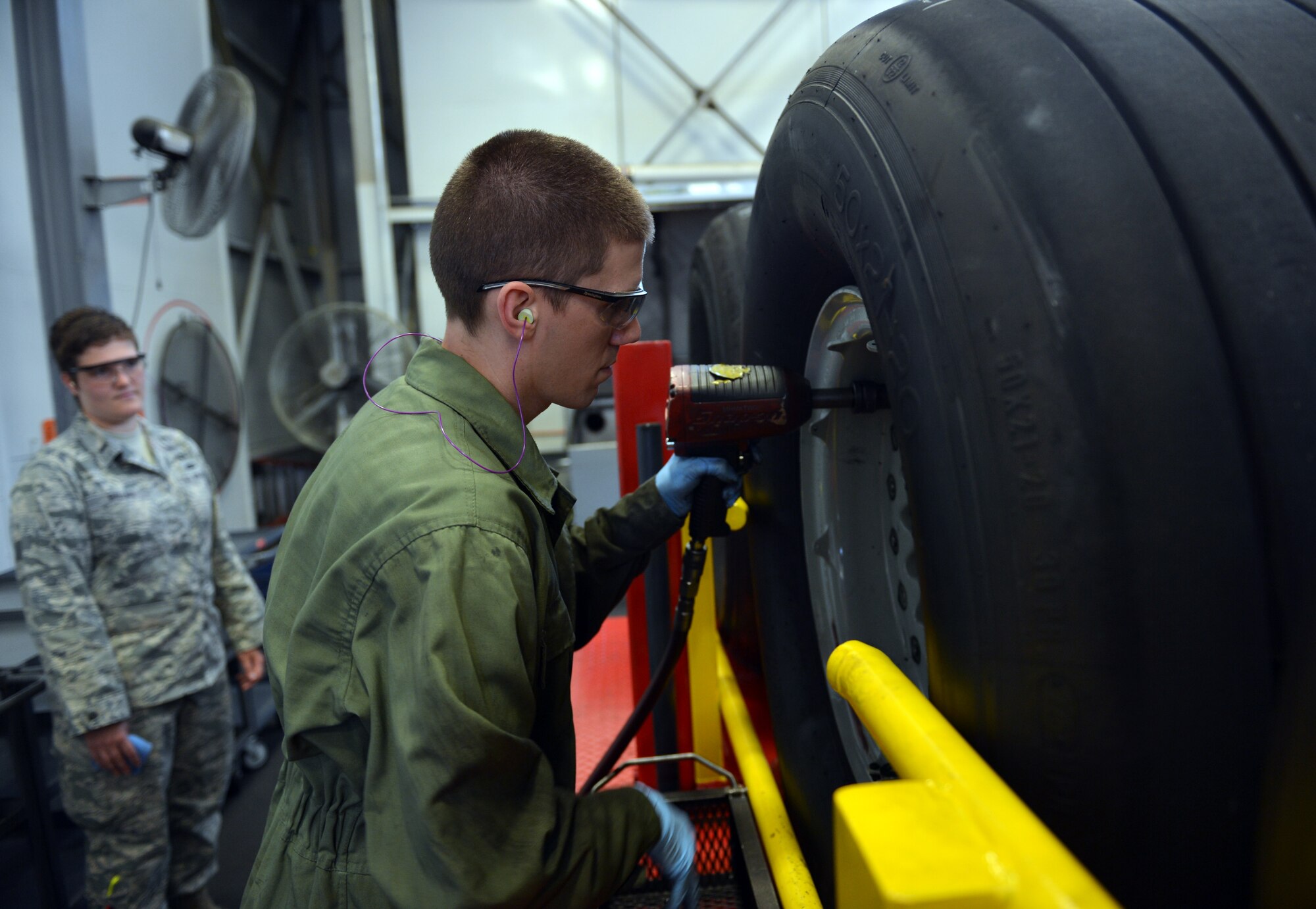 Staff Sgt. Christopher Hirsch, 62nd Maintenance Squadron aerospace maintenance journeyman, removes wheel bolts and studs from a C-17 Globemaster III wheel assembly Aug. 1, 2013, at Joint Base Lewis-McChord, Wash. Wheel and tire technicians maintain tire assemblies on 48 of McChord Field’s permanently assigned aircraft, equating to roughly 1,300 maintenance actions annually. (U.S. Air Force photo/Staff Sgt. Jason Truskowski)