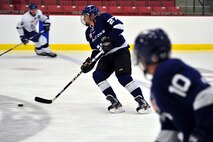 Members of the Fairchild Air Force Base Falcons hockey team play a scrimmage game at Washington State University, Cheney, Wash., July 31, 2013. The team skates year round as a means to prepare for the “Stanley Cup” of military hockey, the Armed Forces Tournament that’s hosted in Las Vegas, Nev., every November. (U.S. Air Force photo by Senior Airman Taylor Curry/Released)