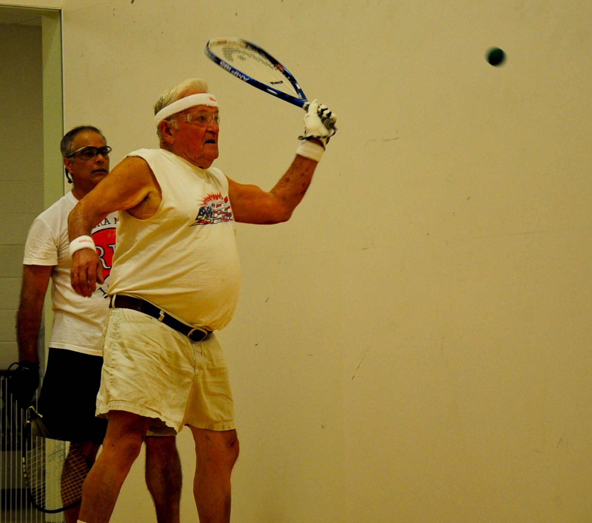 William Dawkins, 85-year-old racquetball player, plays a game of racquetball with Jose Colon, retired technical sergeant in the Air Force, Aug. 4, 2013, at the base gym on Dover Air Force Base, Del. Dawkins plays racquetball at the gym three to four times a week. (U.S. Air Force photo/Airman 1st Class Ashlin Federick)