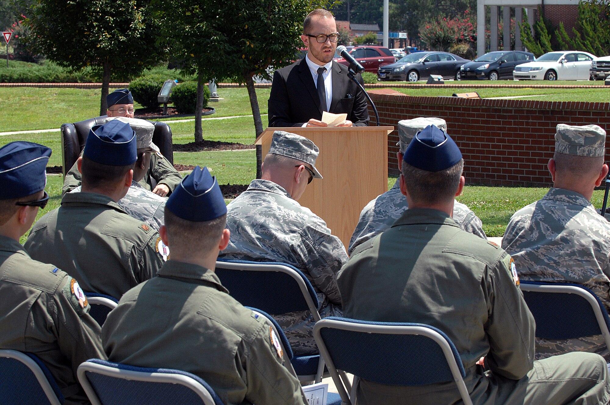 Thomas Nash, grandson of retired Col. Van Chandler, gives a speech about the legacy of his grandfather and what he learned about him during his visit to Seymour Johnson Air Force Base, N.C., Aug. 5, 2013.  “It’s been good to learn the things that he did and the love that he had for this country,” said Nash.  (U.S. Air Force photo by Airman 1st Class Brittain Crolley/Released)