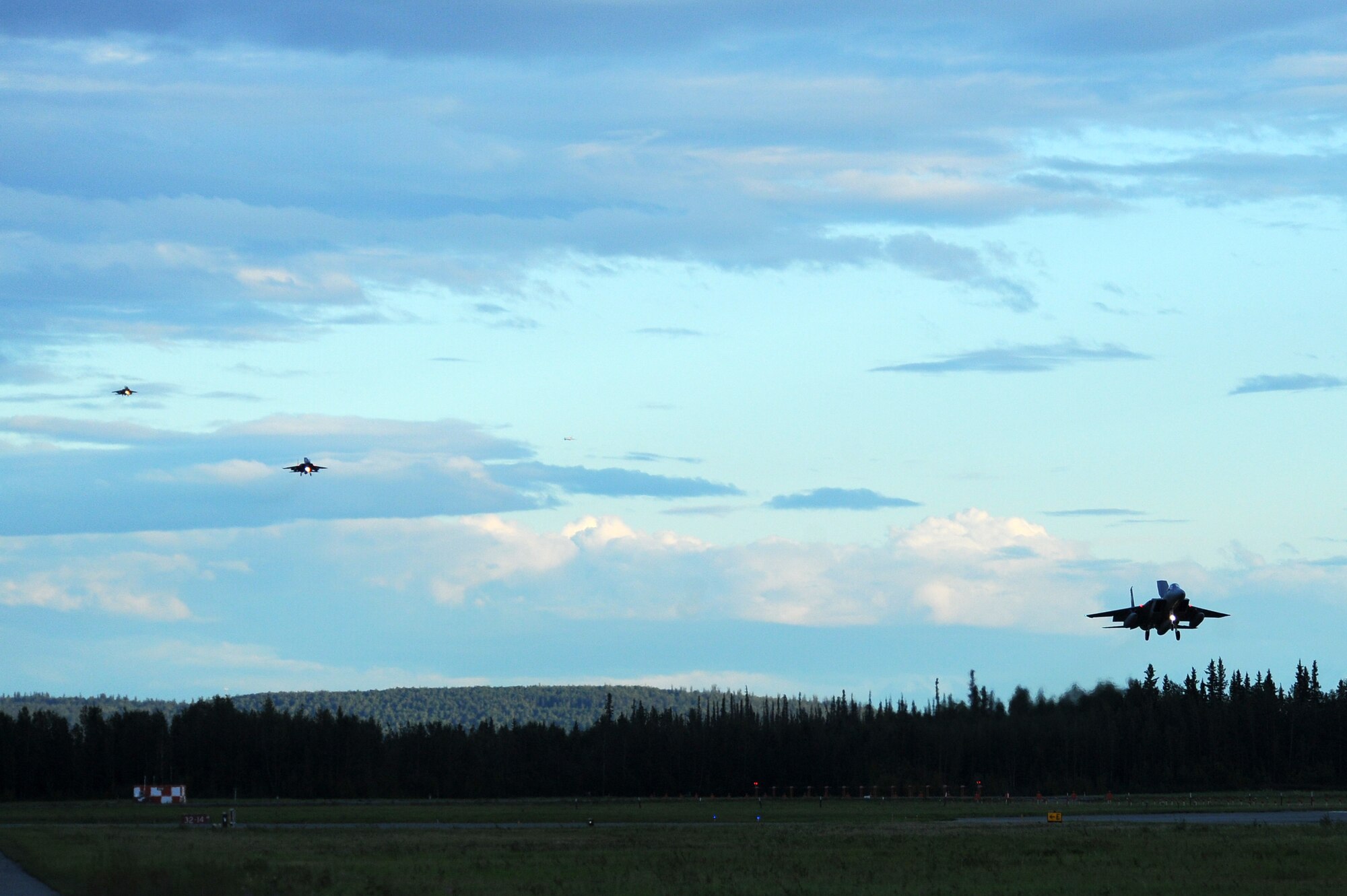 F-15 Eagles from the Japan Air Self Defense Force arrive for RED FLAG-Alaska 13-3 Aug. 4, 2013, Eielson Air Force Base, Alaska. RF-A is a series of Pacific Air Force commander-directed field training exercises for U.S. and multi-national forces and provides joint offensive counter-air, interdiction, close air support and large force employment training in a simulated combat environment. (U.S. Air Force photo by Staff Sgt. Jim Araos/Released)
