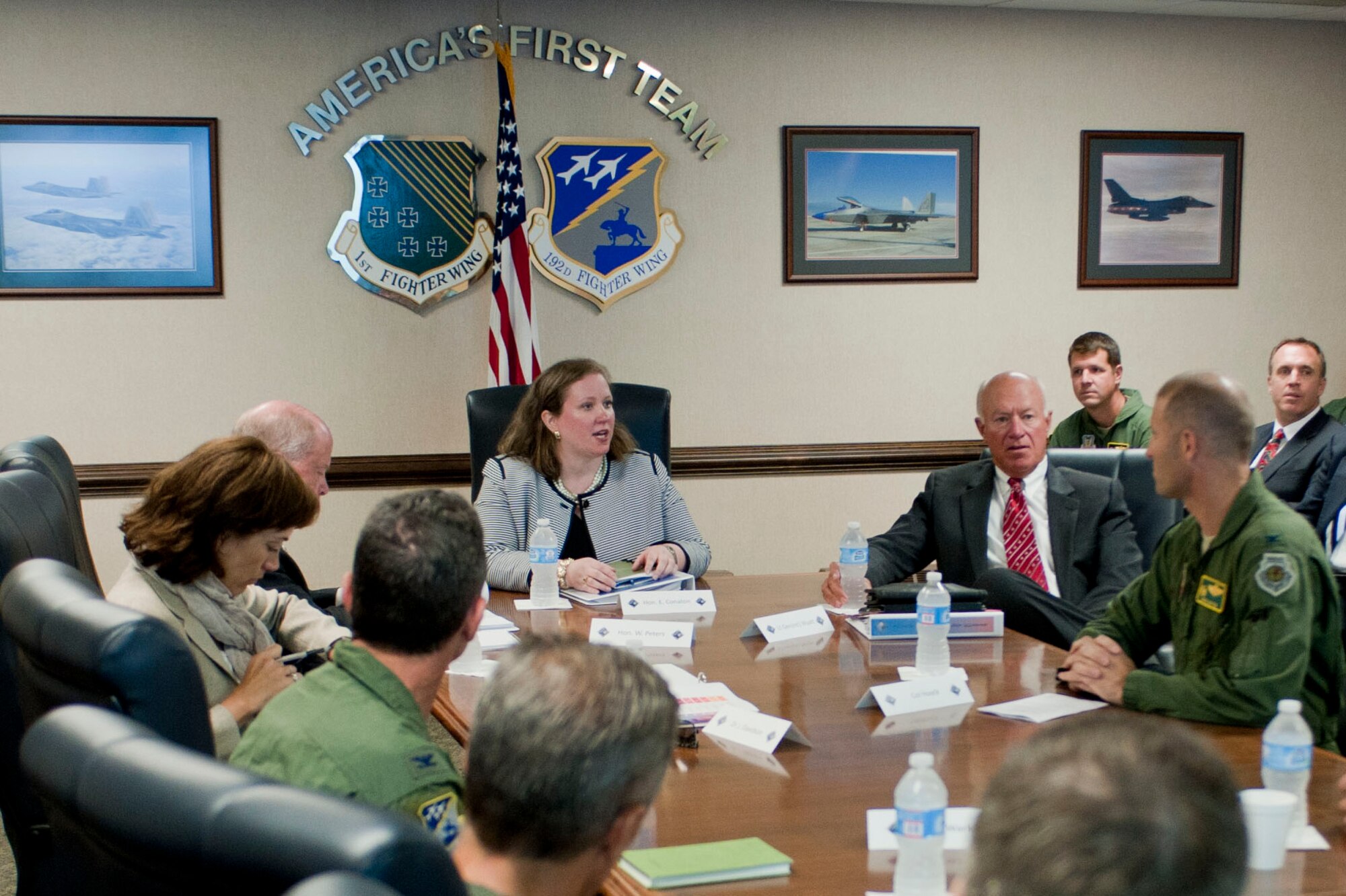 Members of the National Commission on the Structure of the Air Force visit with 1st Fighter Wing and 192nd Fighter Wing representatives at Langley Air Force Base, Va., Aug. 5, 2013. The NCSAF is an independent commission appointed by the fiscal year 2013 National Defense Authorization Act and is tasked with reviewing the Air Force’s structure to determine possible changes to meet future mission and funding challenges. (U.S. Air Force photo by Staff Sgt. Stephanie Rubi/Released)