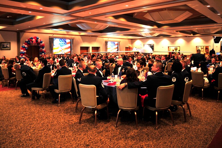NELLIS AIR FORCE BASE, Nev. -- Attendees listen to various guest speakers during the Creech Air Force Base Senior Noncommissioned Officer Induction Ceremony Aug. 2, 2013.  This year’s speakers included an airman, NCO, SNCO and company grade officer, who discussed characteristics of effective SNCOs as the inductees prepare to transition from the NCO tier to the senior NCO tier. (U.S. Air Force photo by 1st Lt. S.S./Released)