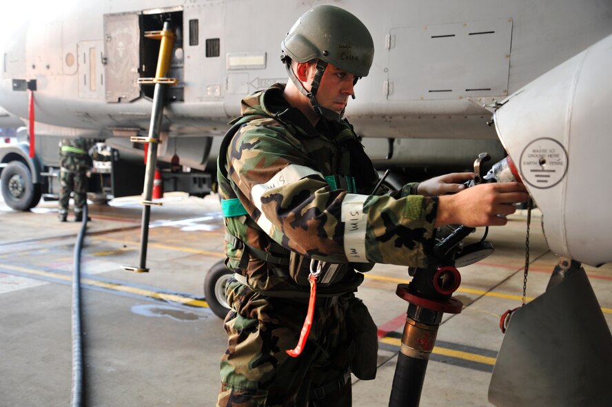 Staff Sgt. Caleb Parton, 51st Aircraft Maintenance Squadron crew chief, fuels up an A-10 Thunderbolt during Operational Readiness Exercise Beverly Midnight 13-03 at Osan Air Base, Republic of Korea, August 6, 2013. During OREs, Airmen highlight their ability to position, employ and sustain forces and showcase operational readiness. (U.S. Air Force photo/Staff Sgt. Emerson Nuñez)