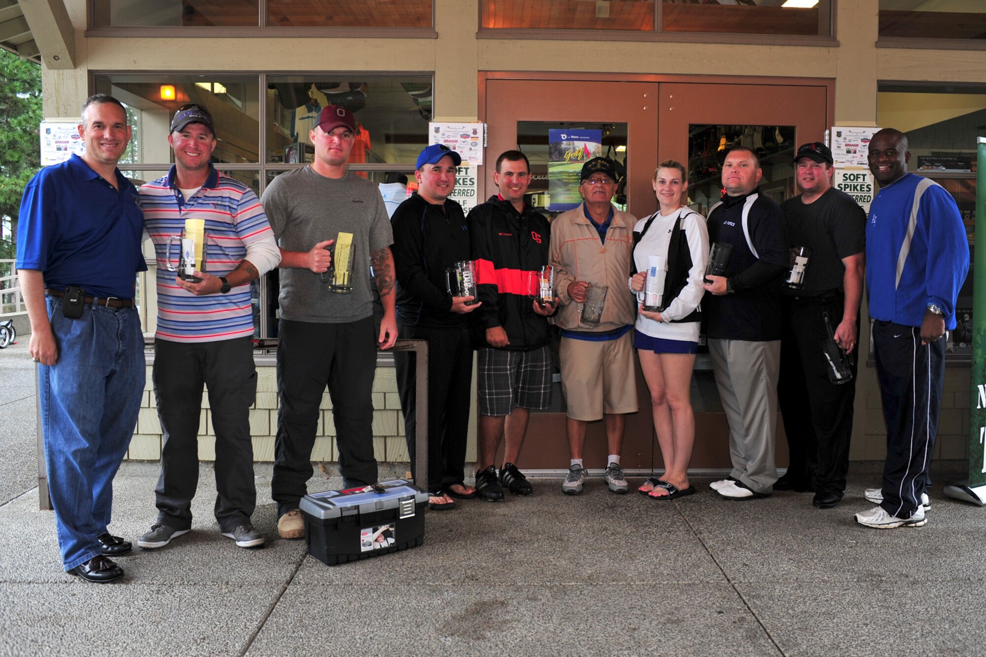 Winners of the Annual 92nd Air Refueling Wing Golf Tournament pose for a photo at the Creek at Qualchan Golf Course in Spokane, Wash., Aug. 2, 2013. There were 142 participants signed up for the tournament. (U.S. Air Force photo by Senior Airman Taylor Curry/ Released)