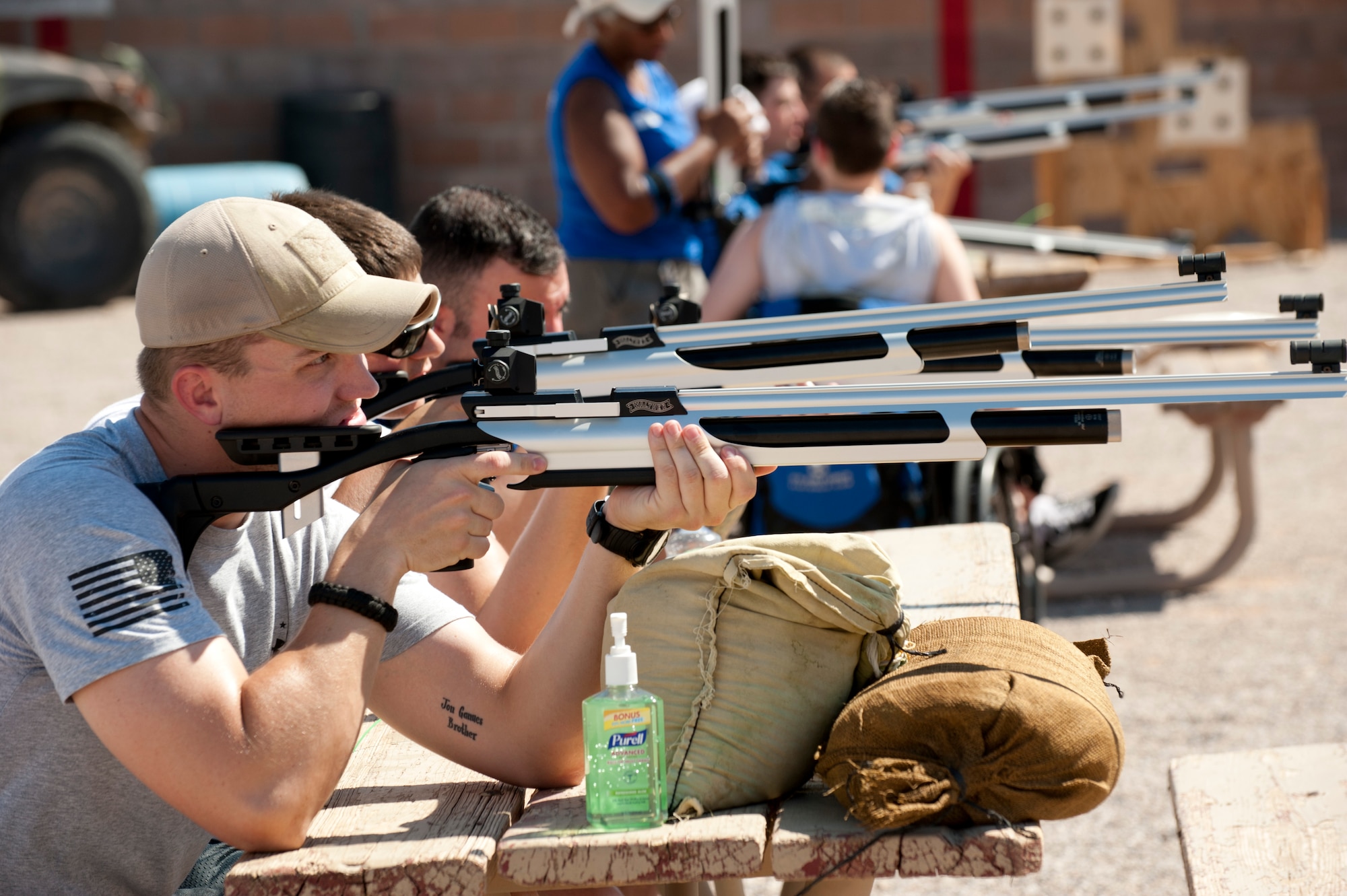 Dan Neild, 56th Medical Group out of Luke Air Force Base, Ariz., aims his airsoft rifle at a target during the Air Force Wounded Warrior Adaptive Sports Camp July 31, 2013, at Nellis Air Force Base, Nev. Airmen like Neild participated in several sport clinics at the Warrior Fitness Center and around Nellis AFB including wheelchair basketball and sit volleyball. (U.S. Air Force photo by Caitlin Kenney)