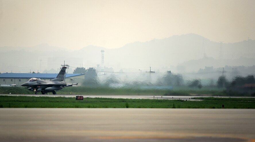 An F-16 Fighting Falcon from the 36th Fighter Squadron prepares to takes off for the first combat sortie of Operational Readiness Exercise Beverly Midnight 13-03 at Osan Air Base, Republic of Korea, Aug. 6, 2013. The week-long exercise tests Airmen’s abilities during a heightened state of readiness while providing combat ready forces for close air support, air strike control, forward air control-airborne, combat search and rescue, counter air and fire, and interdiction in the defense of the ROK. (U.S. Air Force photo/Staff Sgt. Sara Csurilla)