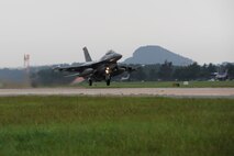 KUNSAN AIR BASE, Republic of Korea – An F-16 Fighting Falcon with the 35th Fighter Squadron takes off during exercise Beverly Midnight 13-3, Aug. 6, 2013. The exercise evaluates and trains personnel on appropriate responses to various types of attacks. (U.S. Air Force Photo by Staff Sgt. Tong Duong/Released)