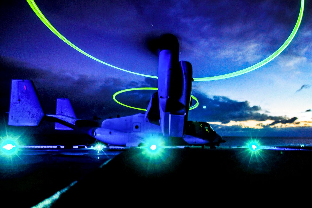 An MV-22 Osprey aircraft takes off during flight operations aboard the amphibious assault ship USS Boxer in the Pacific Ocean, July 31, 2013. The Boxer Amphibious Ready Group is underway off the coast of Southern California completing a certification exercise. The Osprey is assigned to the Marine Medium Tiltrotor Squadron 166. 