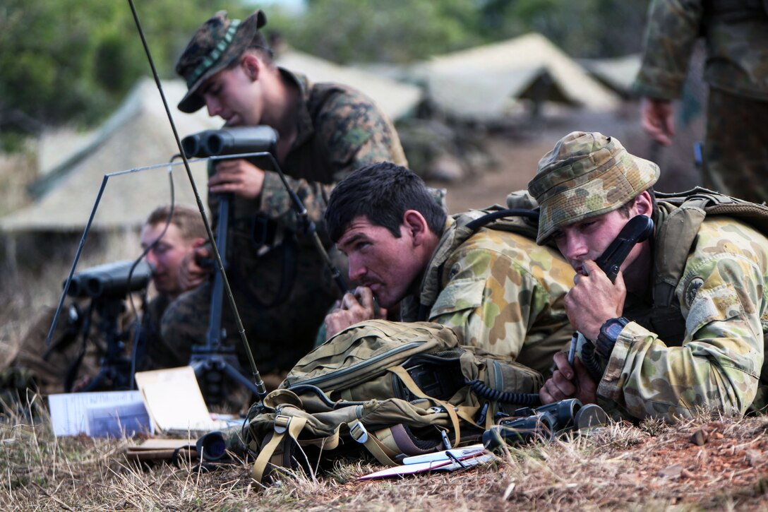 U.S. Marines and Australian artillery forward observers coordinate artillery and mortar fire during a four-day, live-fire exercise following the end of Talisman Saber 2013 in Townshed Island, Australia, Aug. 3, 2013. The live-fire exercise included the coordination of fire-support assets from the 31st Marine Expeditionary Unit; the Australian army and several ships. 