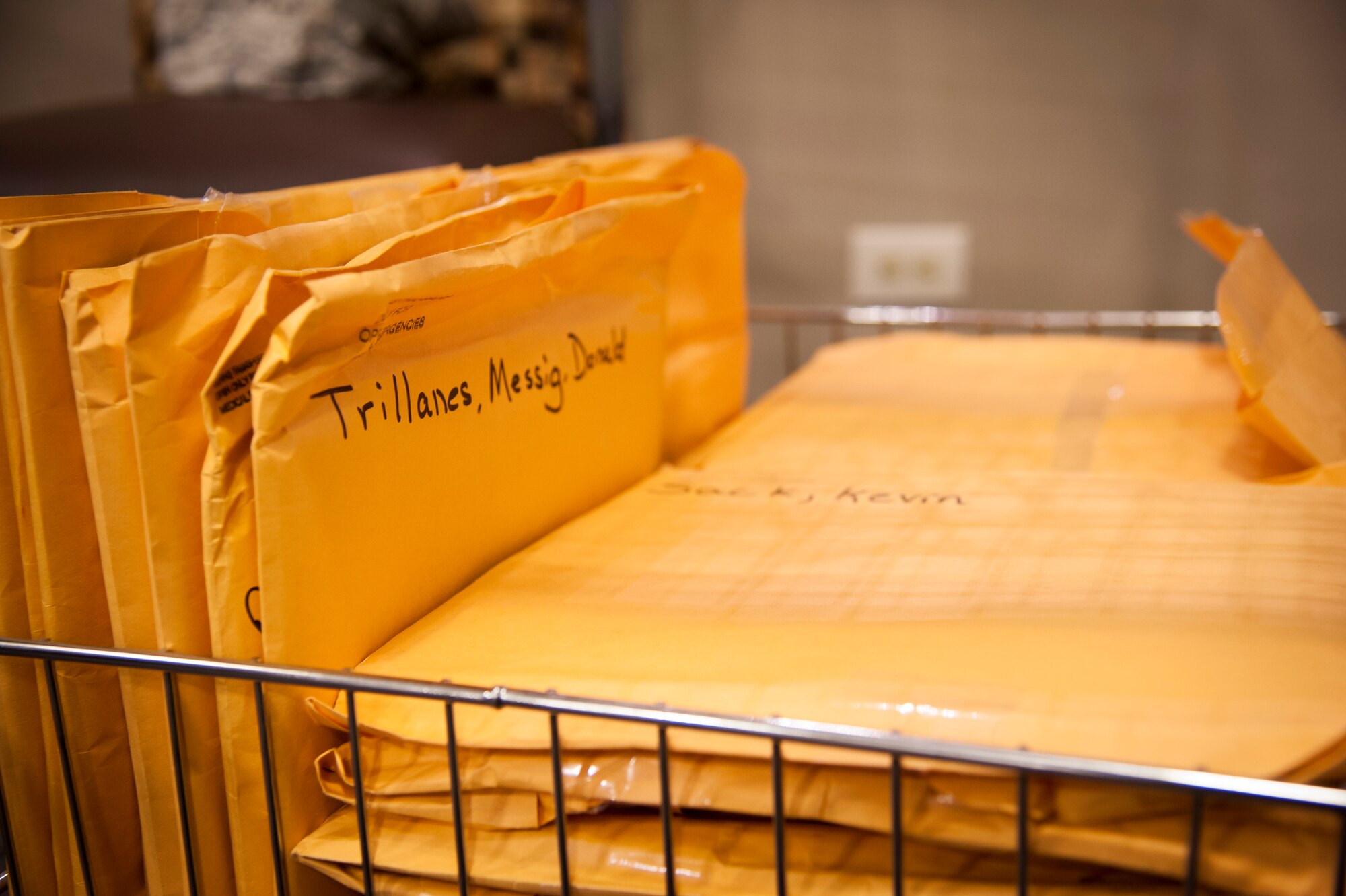 Records sit in a basket at Laughlin Air Force Base, Texas, Aug. 6, 2013. The records belong to in-processing lieutenants whom recently graduated from the U.S. Air Force Academy. (U.S. Air Force photo/Senior Airman John D. Partlow)