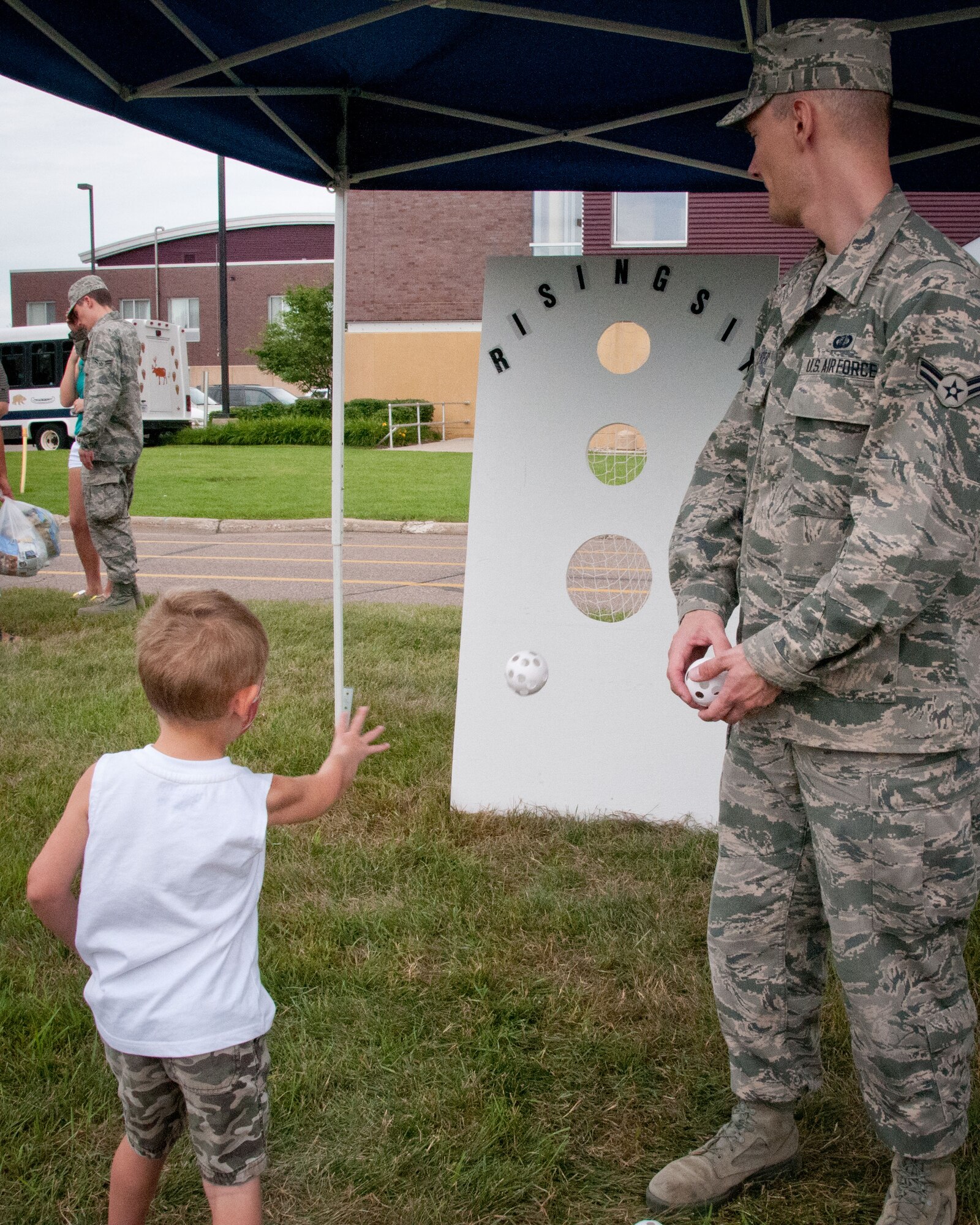 Friends and families of the 934th Airlift Wing Airmen come enjoy this year's Family Day festivites.  The annual event is an opportunity for the Airmen to invite their family out to the base for a picnic lunch, raffles, displays, and many other activities.  (U.S. Air Force photo/934th Airlift Wing Public Affairs)