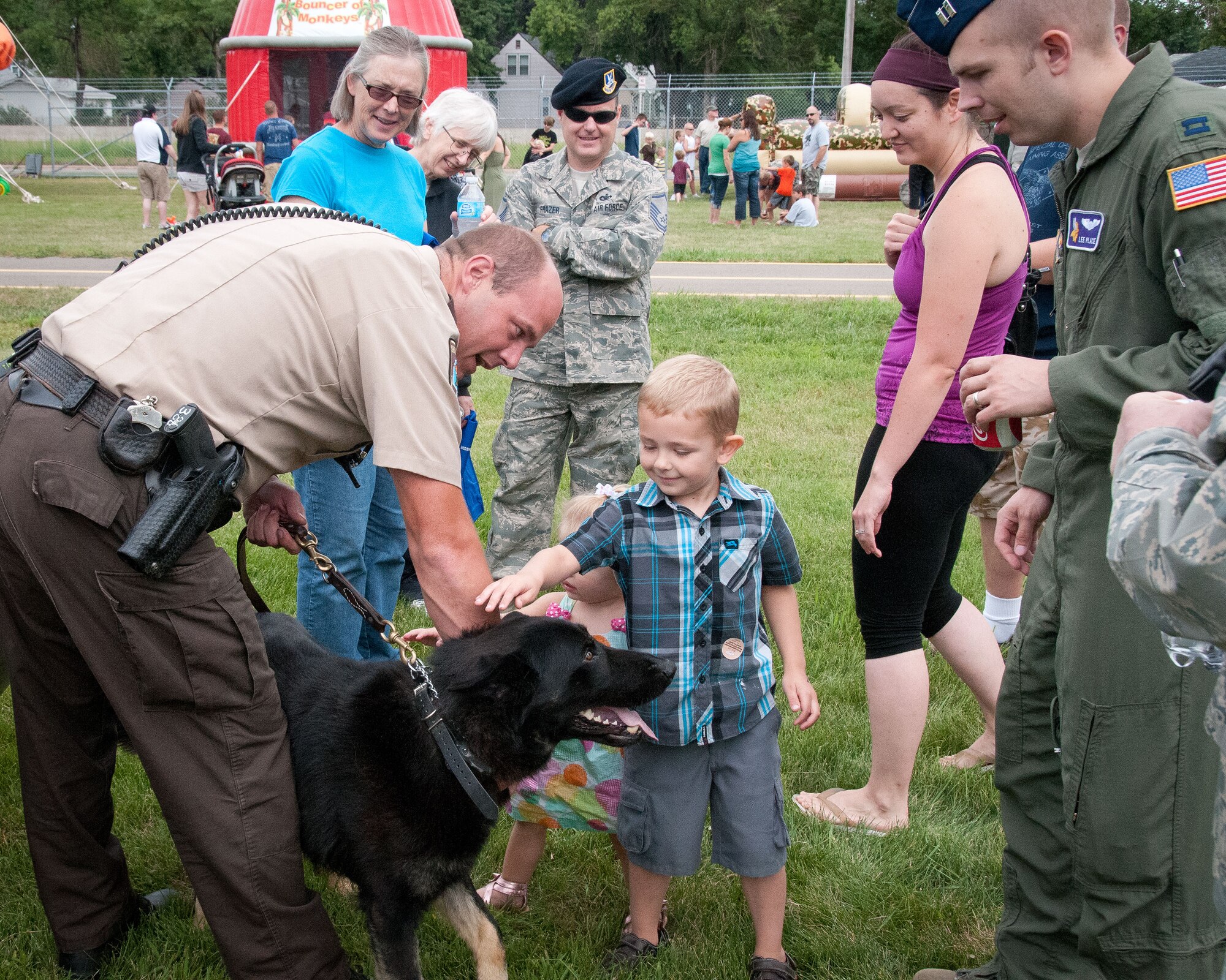 Friends and families of the 934th Airlift Wing Airmen come enjoy this year's Family Day festivites.  The annual event is an opportunity for the Airmen to invite their family out to the base for a picnic lunch, raffles, displays, and many other activities.  (U.S. Air Force photo/934th Airlift Wing Public Affairs)