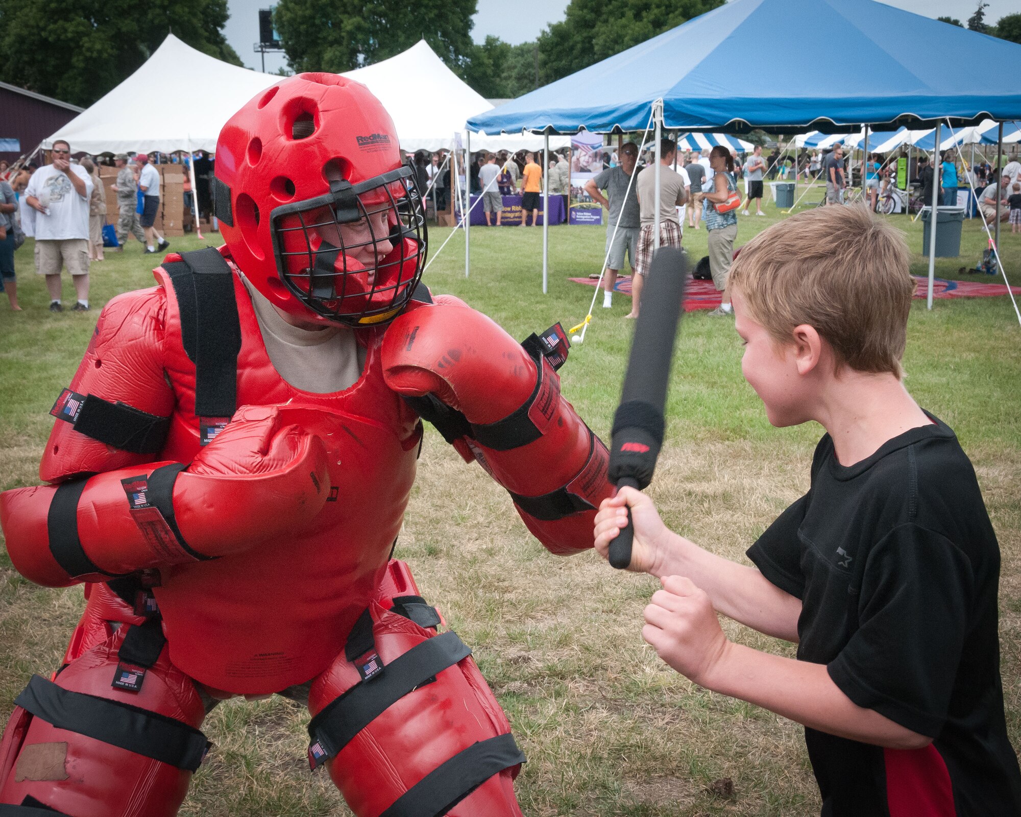 Friends and families of the 934th Airlift Wing Airmen come enjoy this year's Family Day festivites.  The annual event is an opportunity for the Airmen to invite their family out to the base for a picnic lunch, raffles, displays, and many other activities.  (U.S. Air Force photo/934th Airlift Wing Public Affairs)